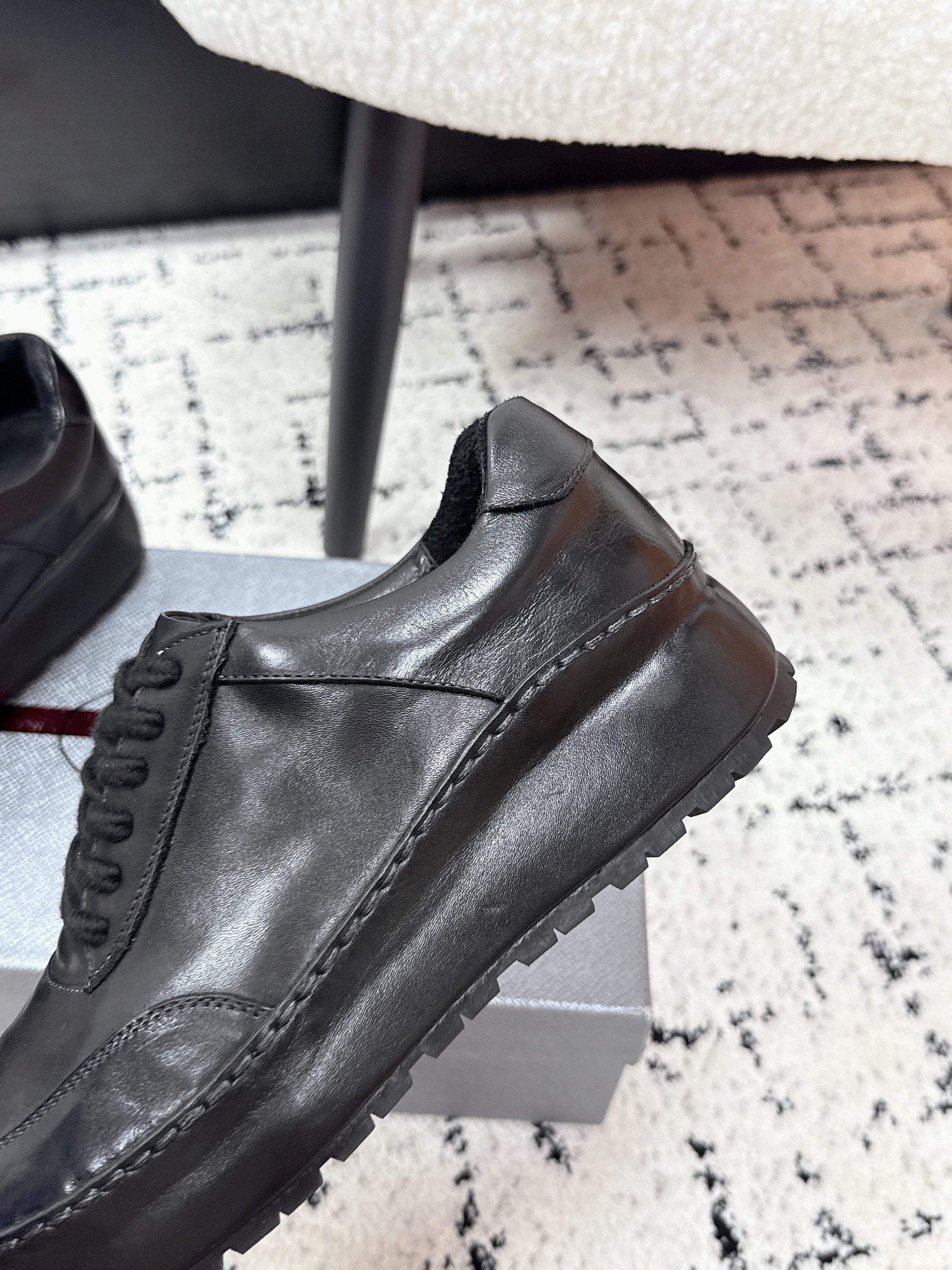 PRADA 26S SNEAKERS IN BLACK SHINY CALFSKIN