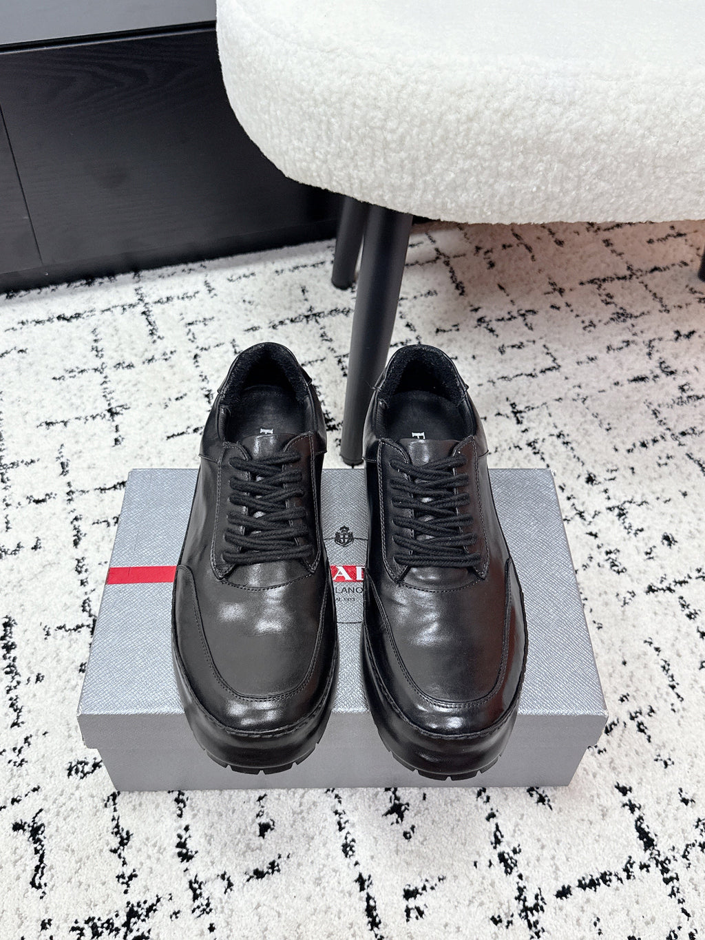 PRADA 26S SNEAKERS IN BLACK SHINY CALFSKIN
