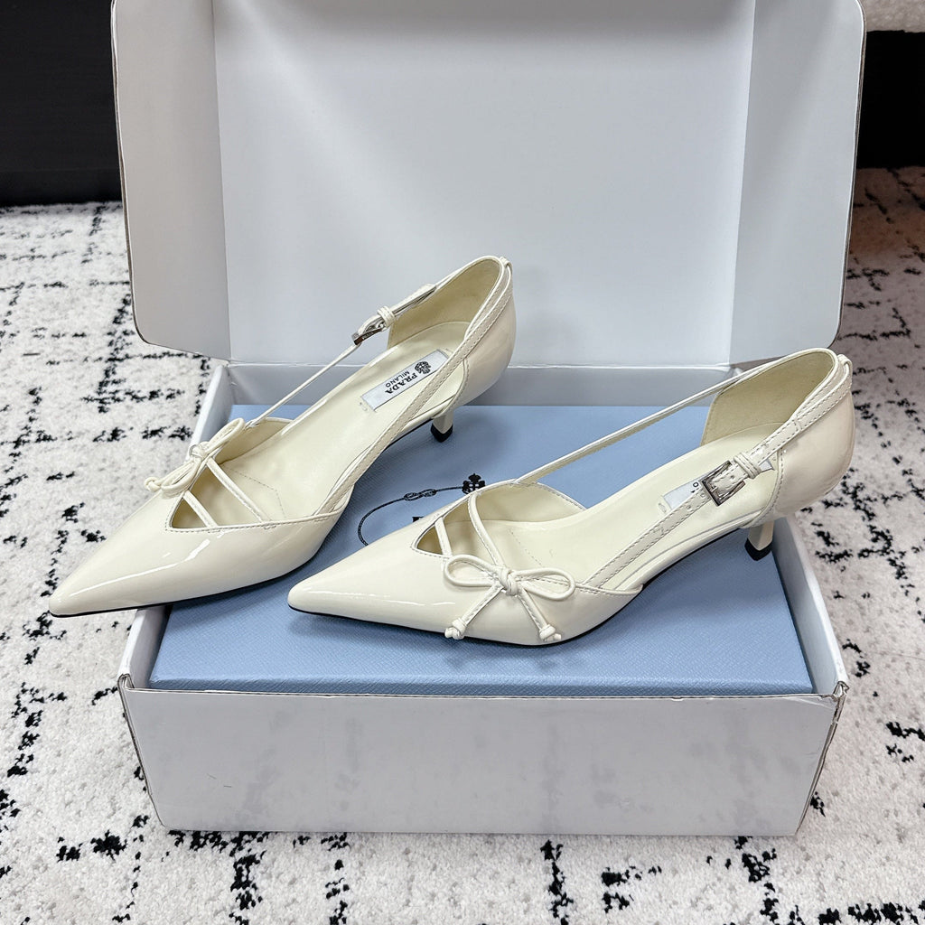 PRADA 26S POINTED-TOE HIGH HEELS 55MM IN IVORY WHITE CALFSKIN WITH BOW