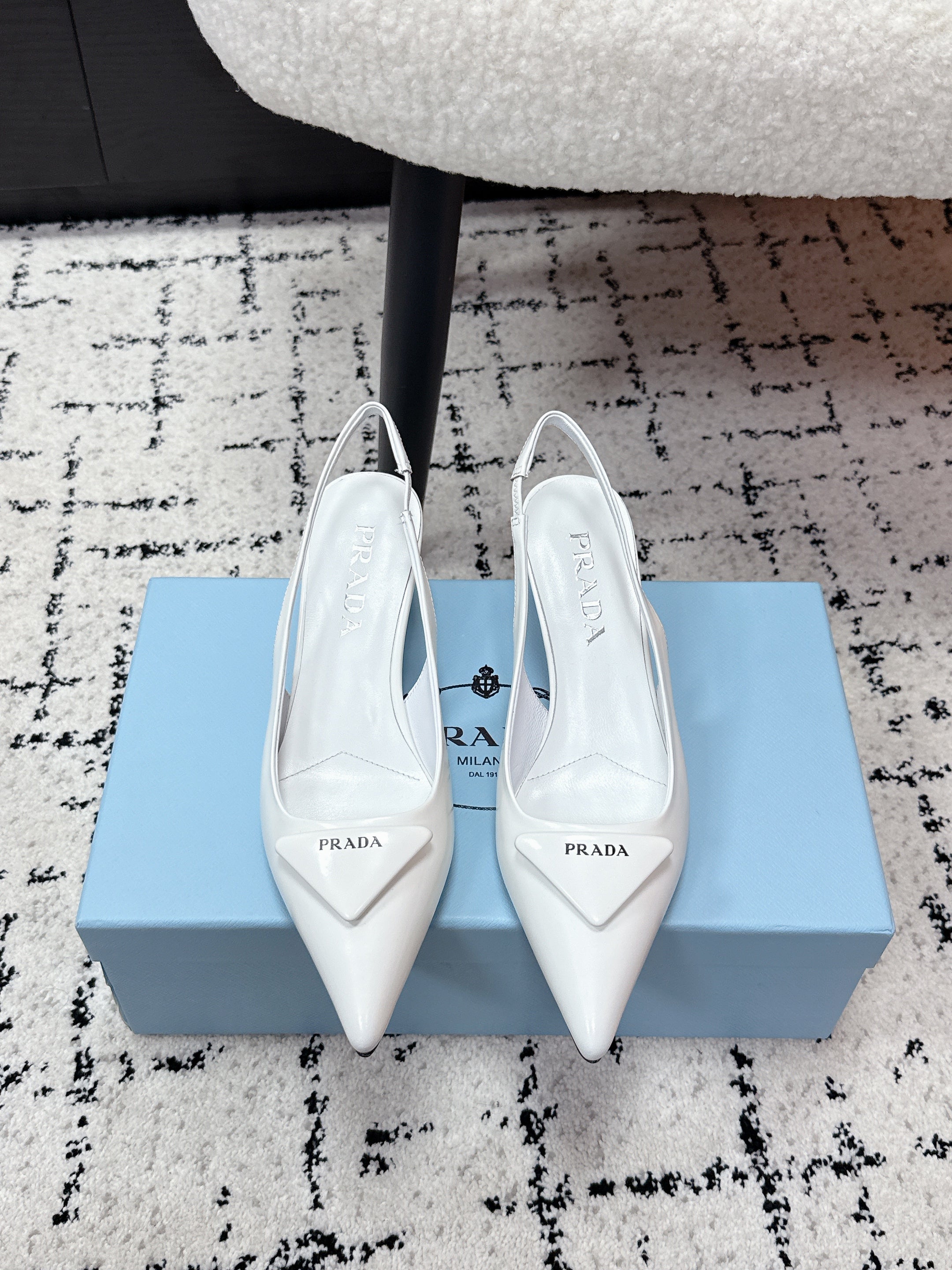 PRADA 26S SLINGBACK PUMPS 60MM IN WHITE PATENT CALFSKIN