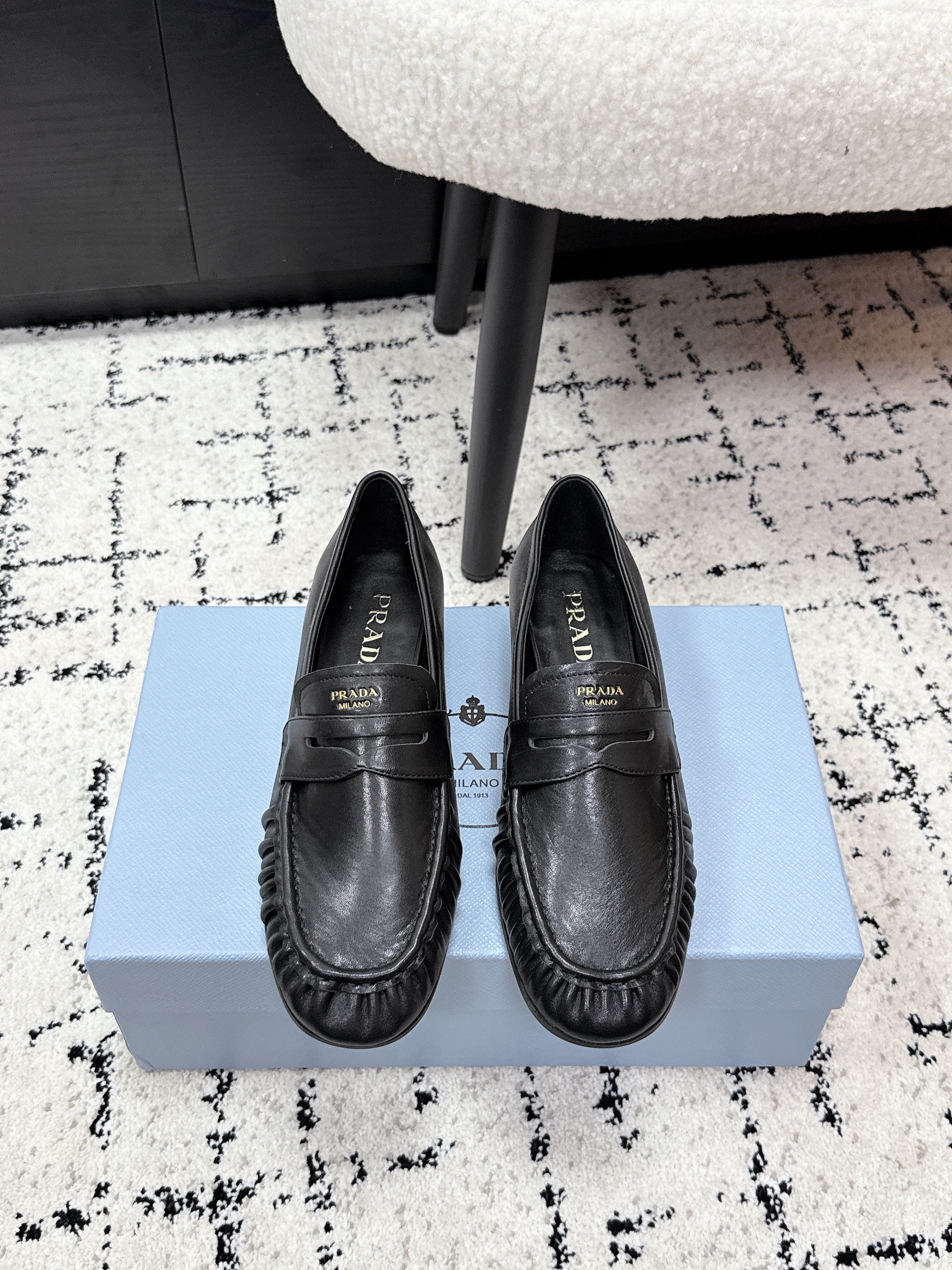PRADA 26S LOAFERS 25MM IN BLACK CALFSKIN
