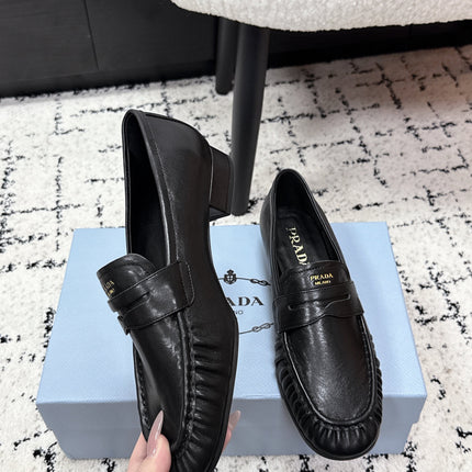 PRADA 26S LOAFERS 25MM IN BLACK CALFSKIN