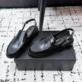 CHANEL 26S SLINGBACK LOAFERS IN BLACK PATENT CALFSKIN WITH CC LOGO