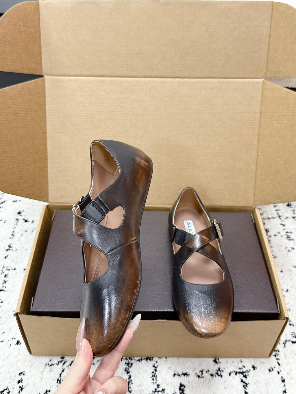 ALAIA 26S CROSS-STRAP BALLET FLATS IN MOTTLED DARK BROWN LAMBSKIN