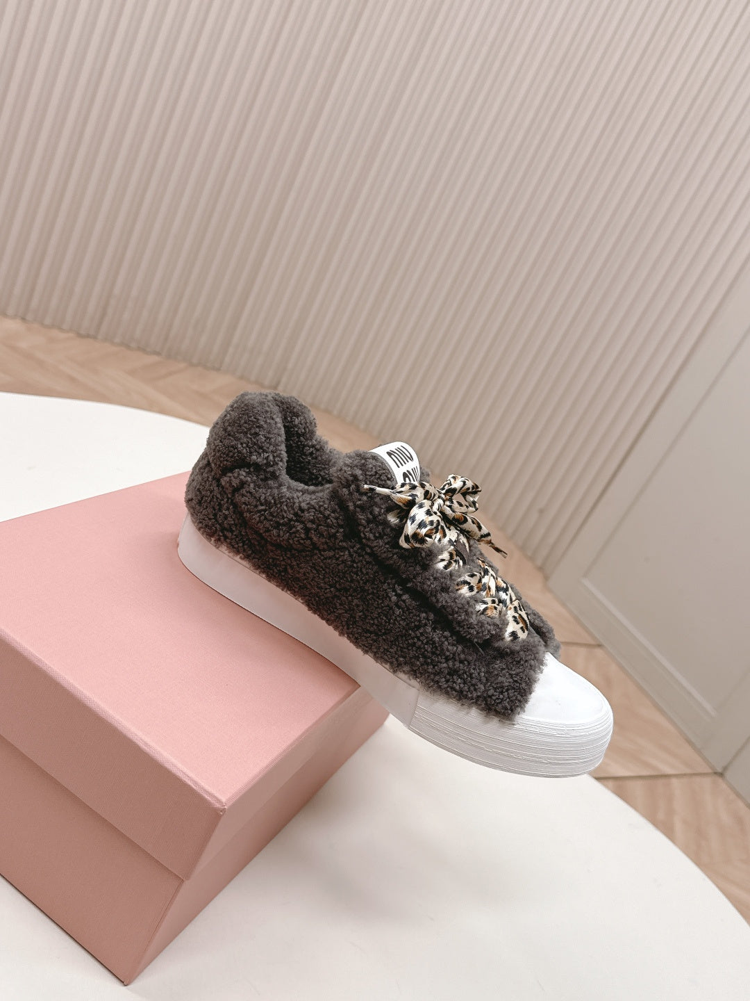 MIUMIU 25S SNEAKERS IN DARK BROWN SHEARLING WITH LEOPARD-PRINT LACES