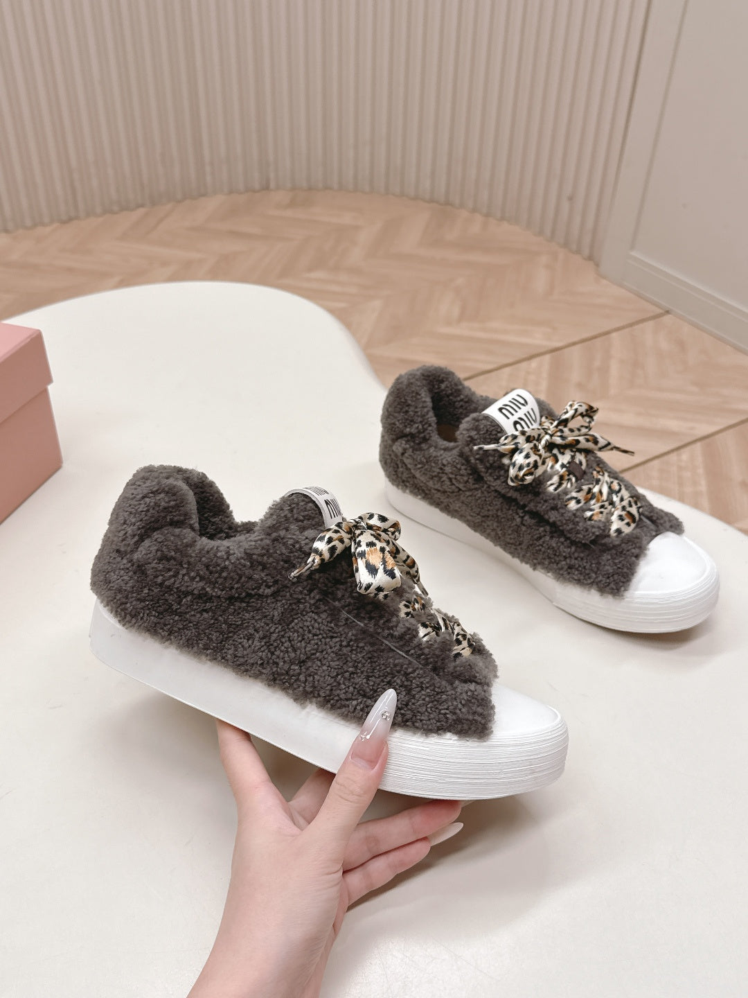 MIUMIU 25S SNEAKERS IN DARK BROWN SHEARLING WITH LEOPARD-PRINT LACES
