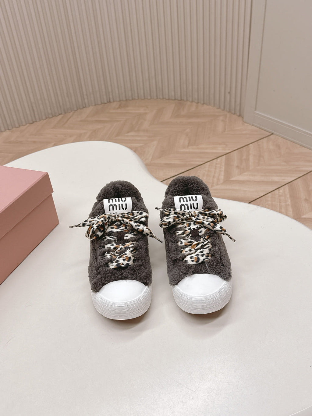 MIUMIU 25S SNEAKERS IN DARK BROWN SHEARLING WITH LEOPARD-PRINT LACES