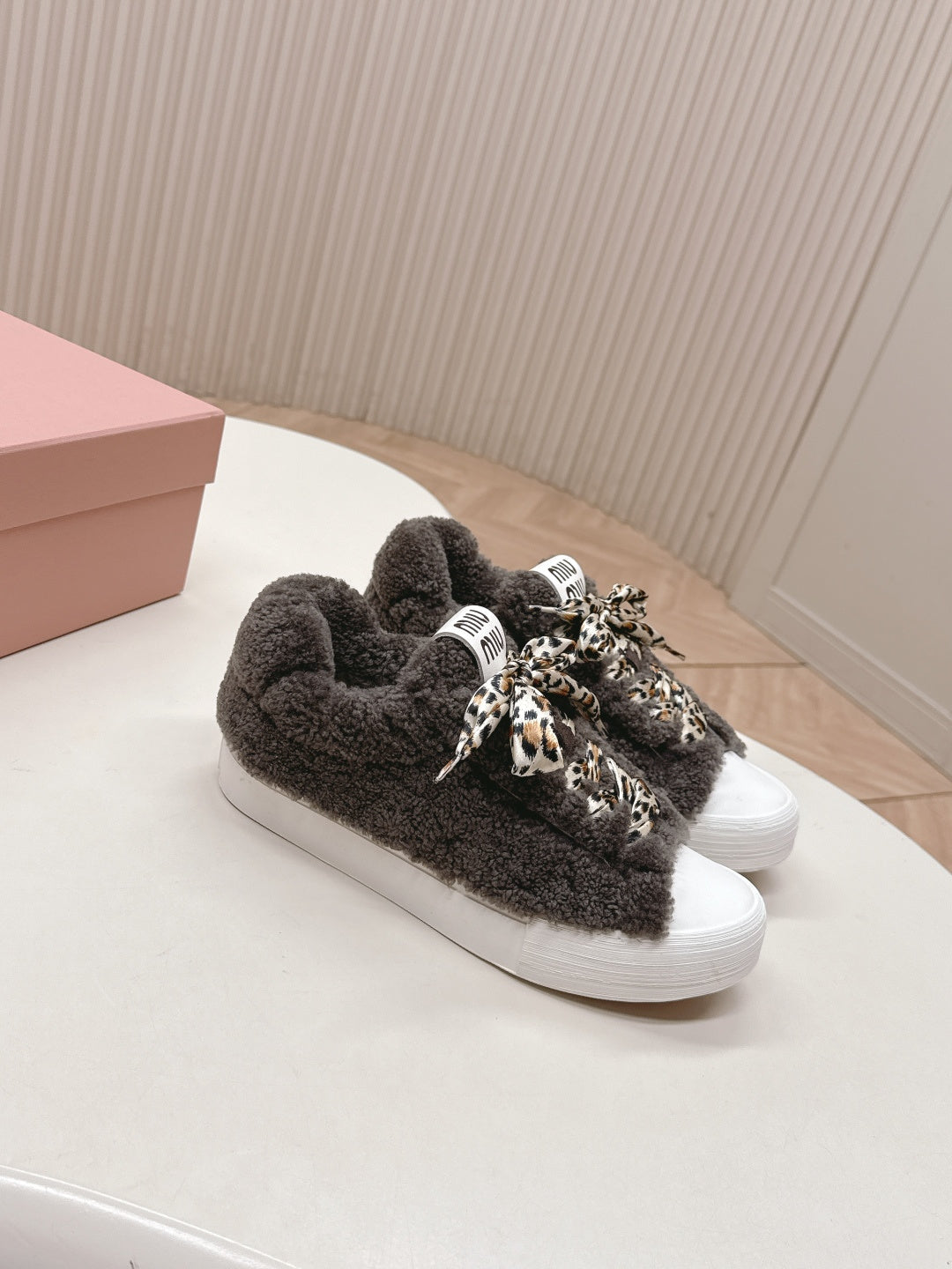 MIUMIU 25S SNEAKERS IN DARK BROWN SHEARLING WITH LEOPARD-PRINT LACES