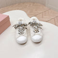 MIUMIU 25S SNEAKERS IN WHITE SHEARLING WITH LEOPARD-PRINT LACES