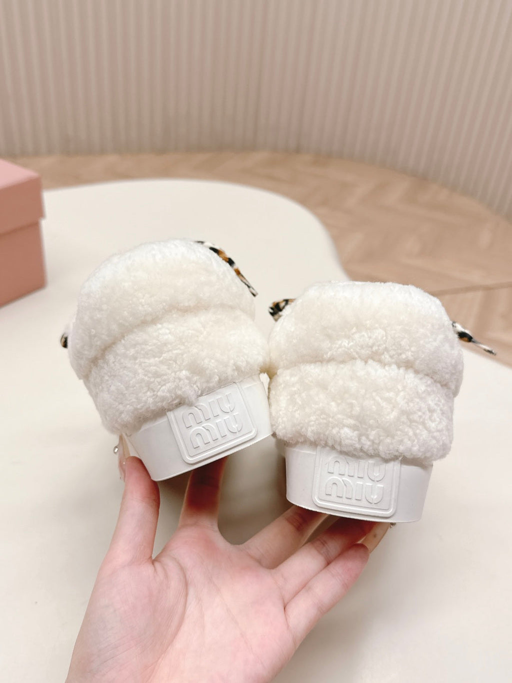 MIUMIU 25S SNEAKERS IN WHITE SHEARLING WITH LEOPARD-PRINT LACES