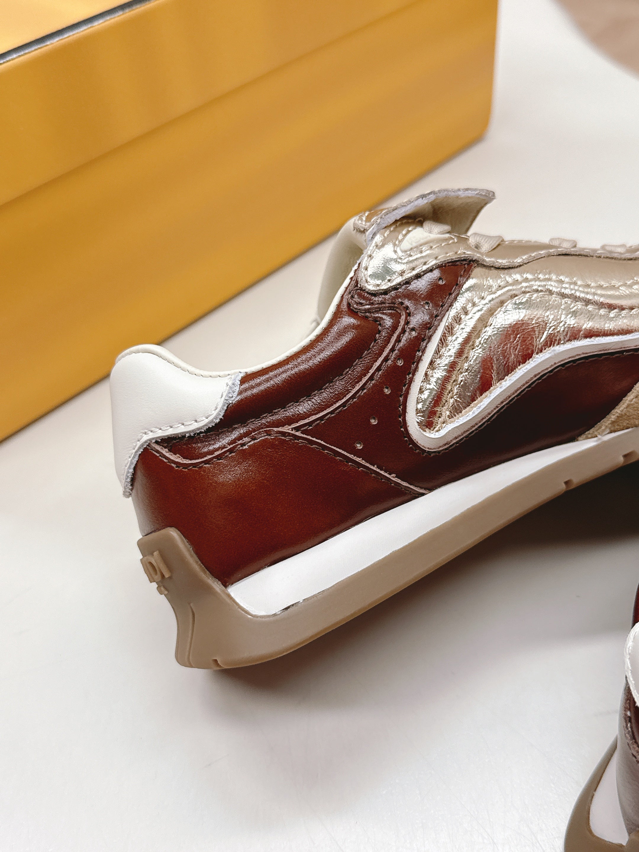 FENDI 25S CORTEZ RETRO SNEAKERS IN SOFT GOLD MIX BROWN LAMBSKIN
