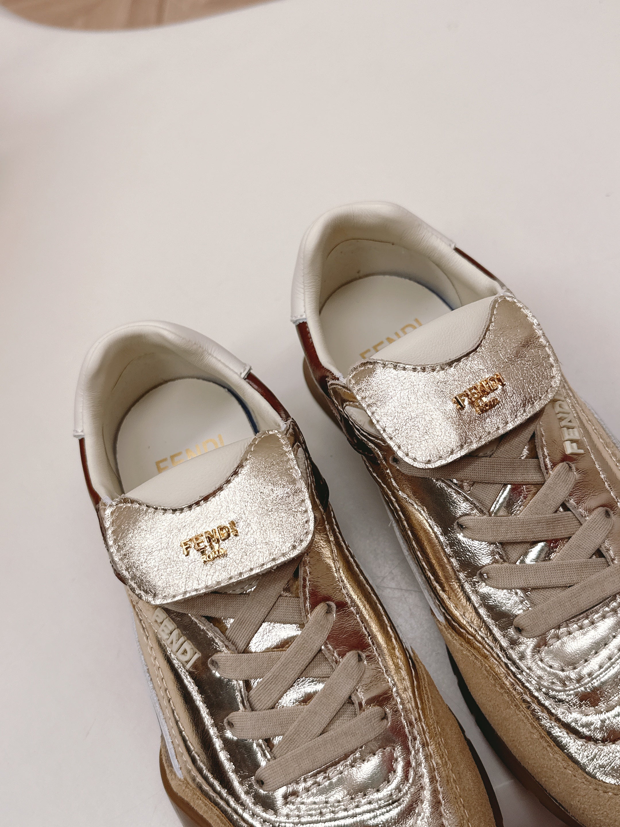 FENDI 25S CORTEZ RETRO SNEAKERS IN SOFT GOLD MIX BROWN LAMBSKIN