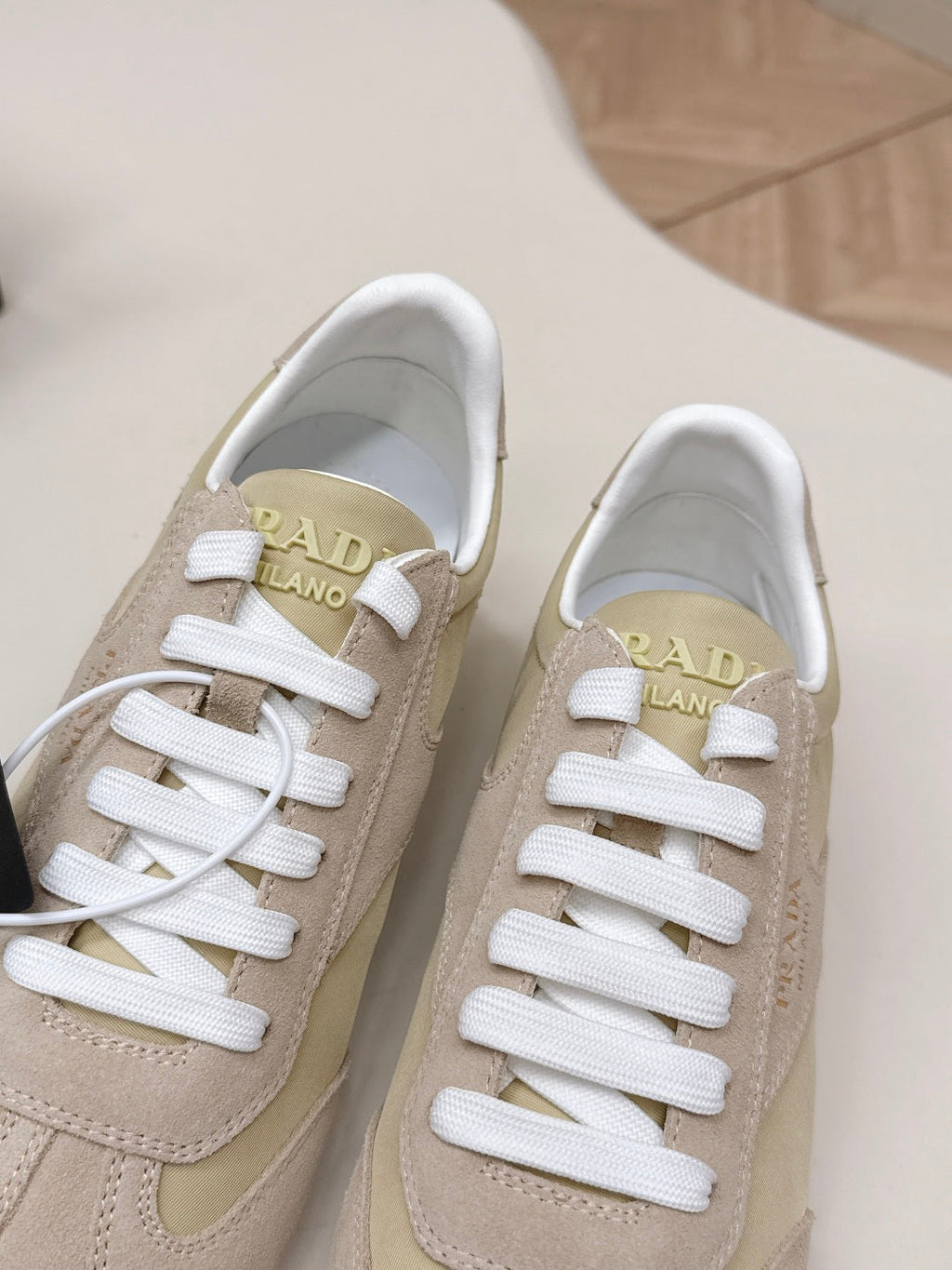 PRADA 26S LOW TOP SNEAKERS IN BEIGE NYLON AND SUEDE