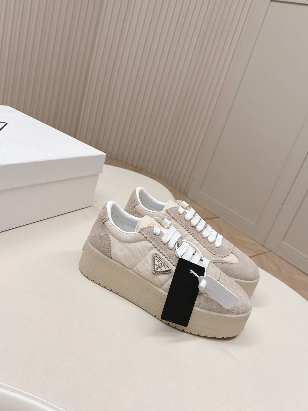 PRADA 26S PLATFORM SNEAKERS 50MM IN CREAM WHITE NYLON AND SUEDE