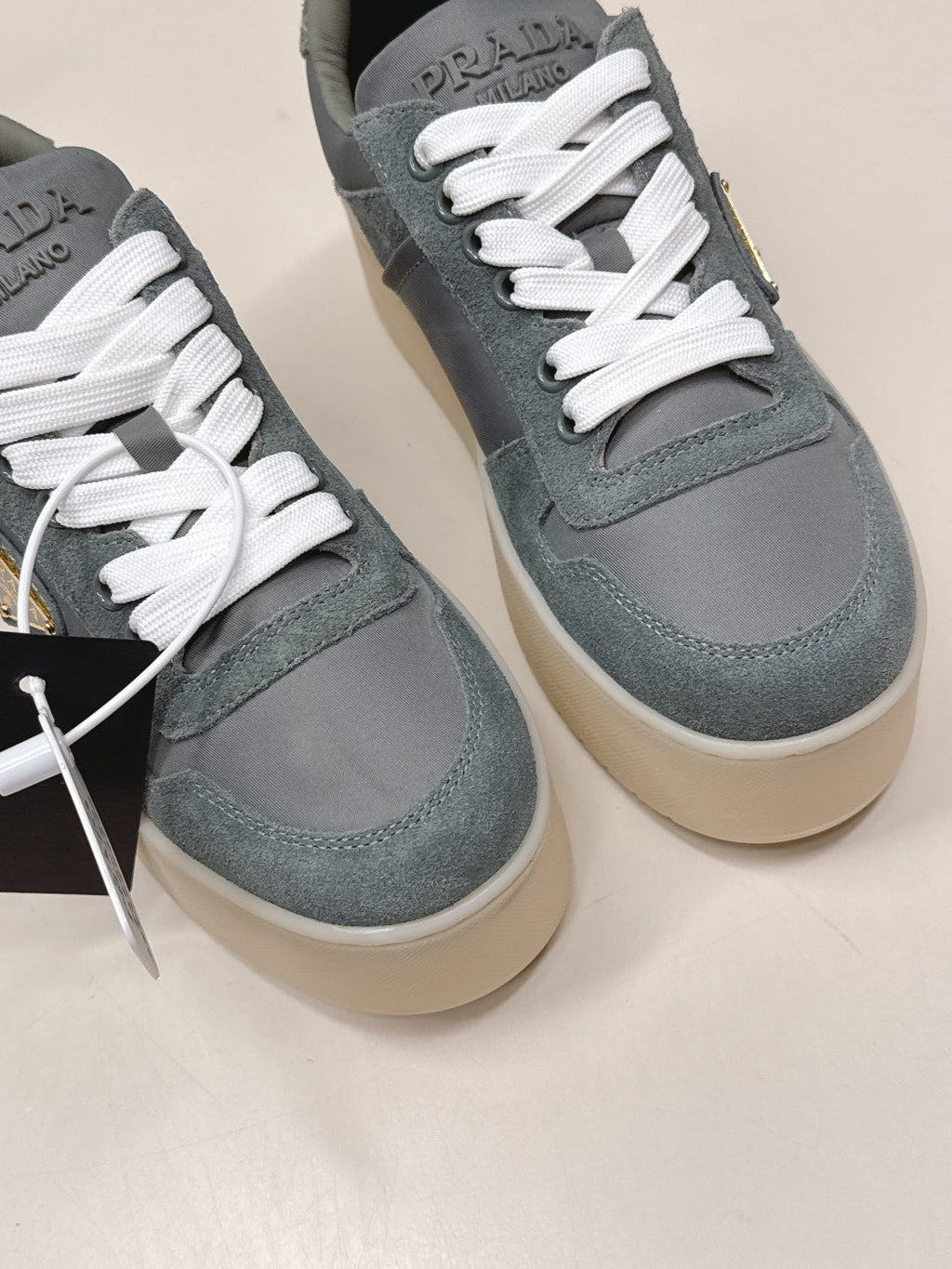 PRADA 26S PLATFORM SNEAKERS 50MM IN DARK GREY SUEDE