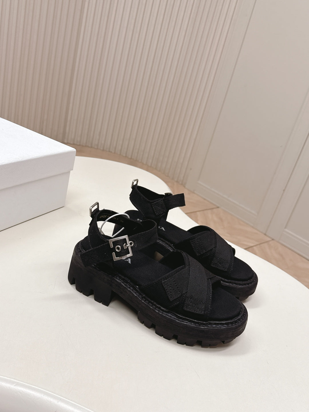 PRADA 26S CROSS STRAP CHUNKY SOLE SANDALS IN BLACK CANVAS