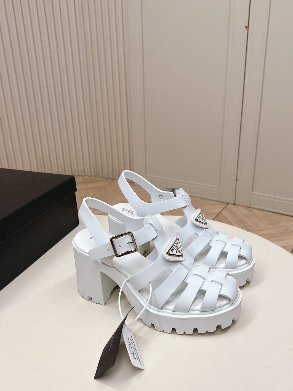 PRADA 26S CAGED PLATFORM HEEL SANDALS IN WHITE CALFSKIN