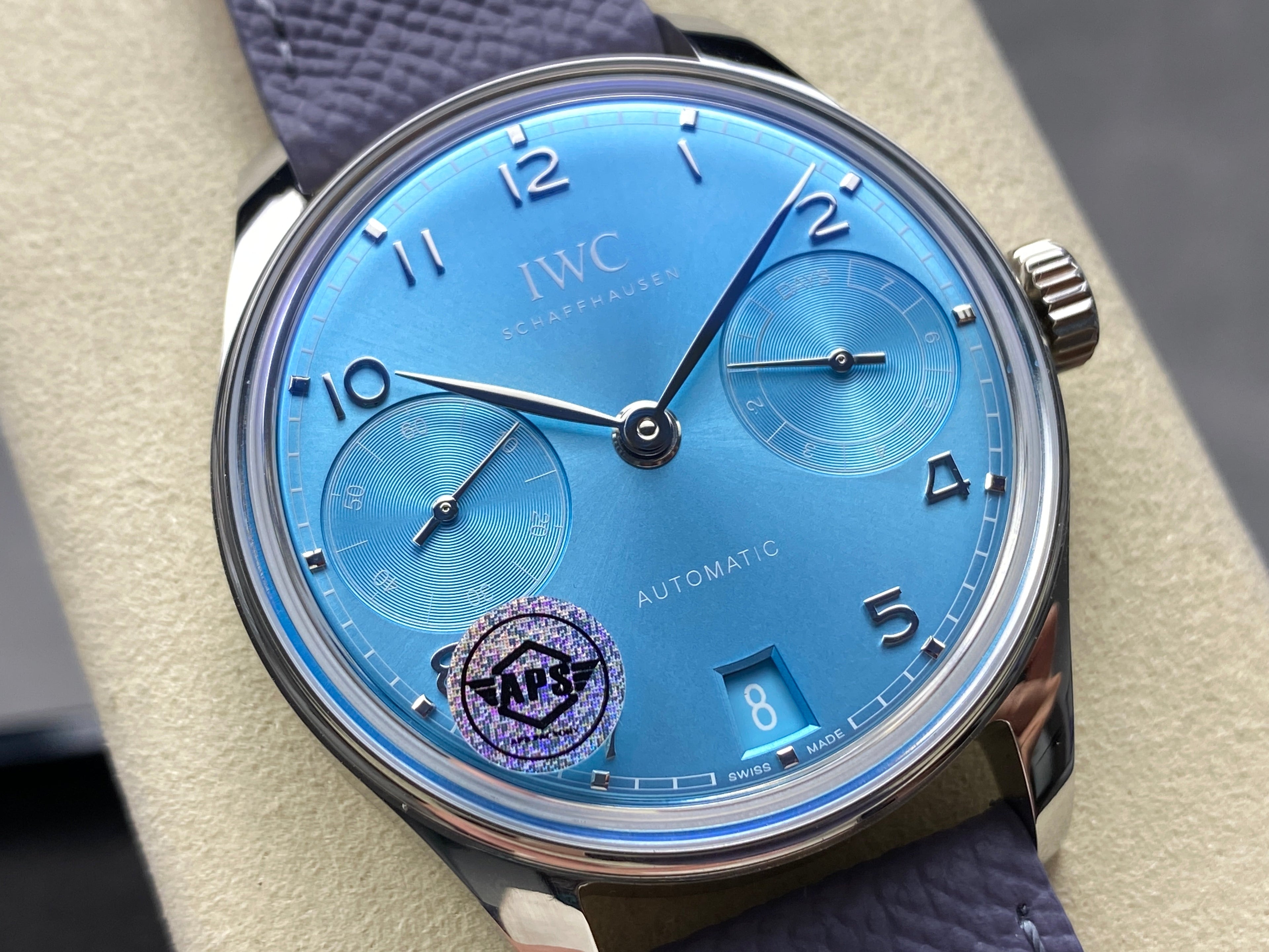 PORTUGIESER AUTOMATIC 42 WATCH SILVER CASE WITH NAVY BLUE LEATHER STRAP AND SAPPHIRE BLUE DIAL