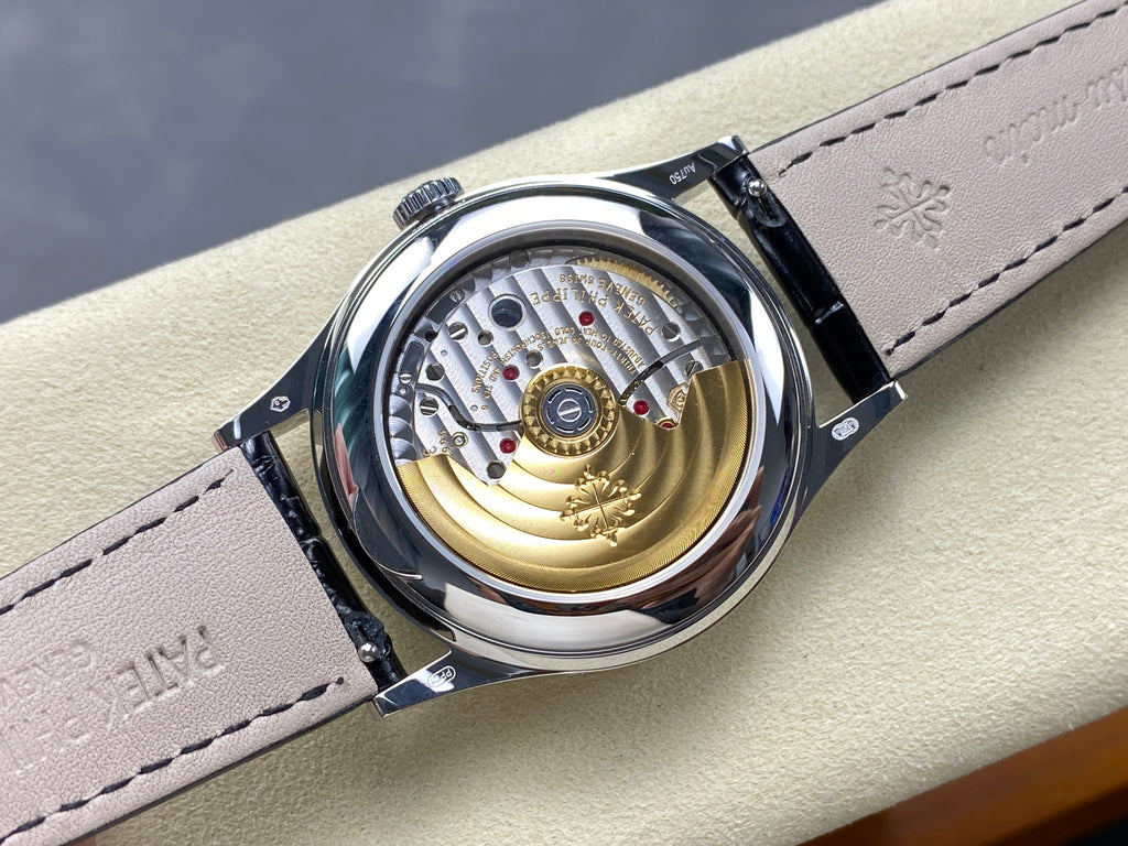 ANNUAL CALENDAR SELF-WINDING WHITE GOLD CASE BROWN BLACK STRAP