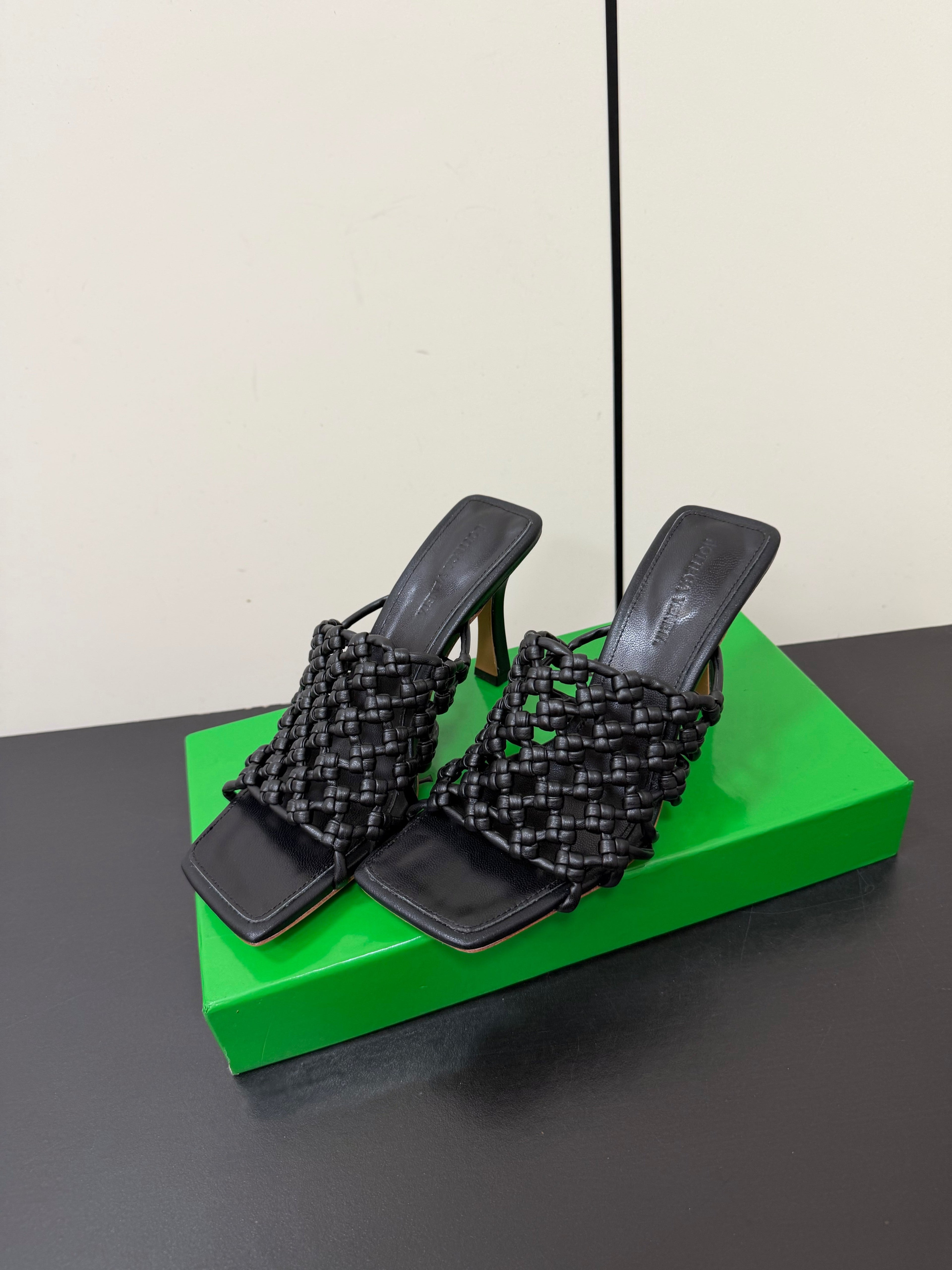 BOTTEGA VENETA 26S WOVEN STRAP HIGH-HEEL SANDALS 85 MM IN BLACK LAMBSKIN