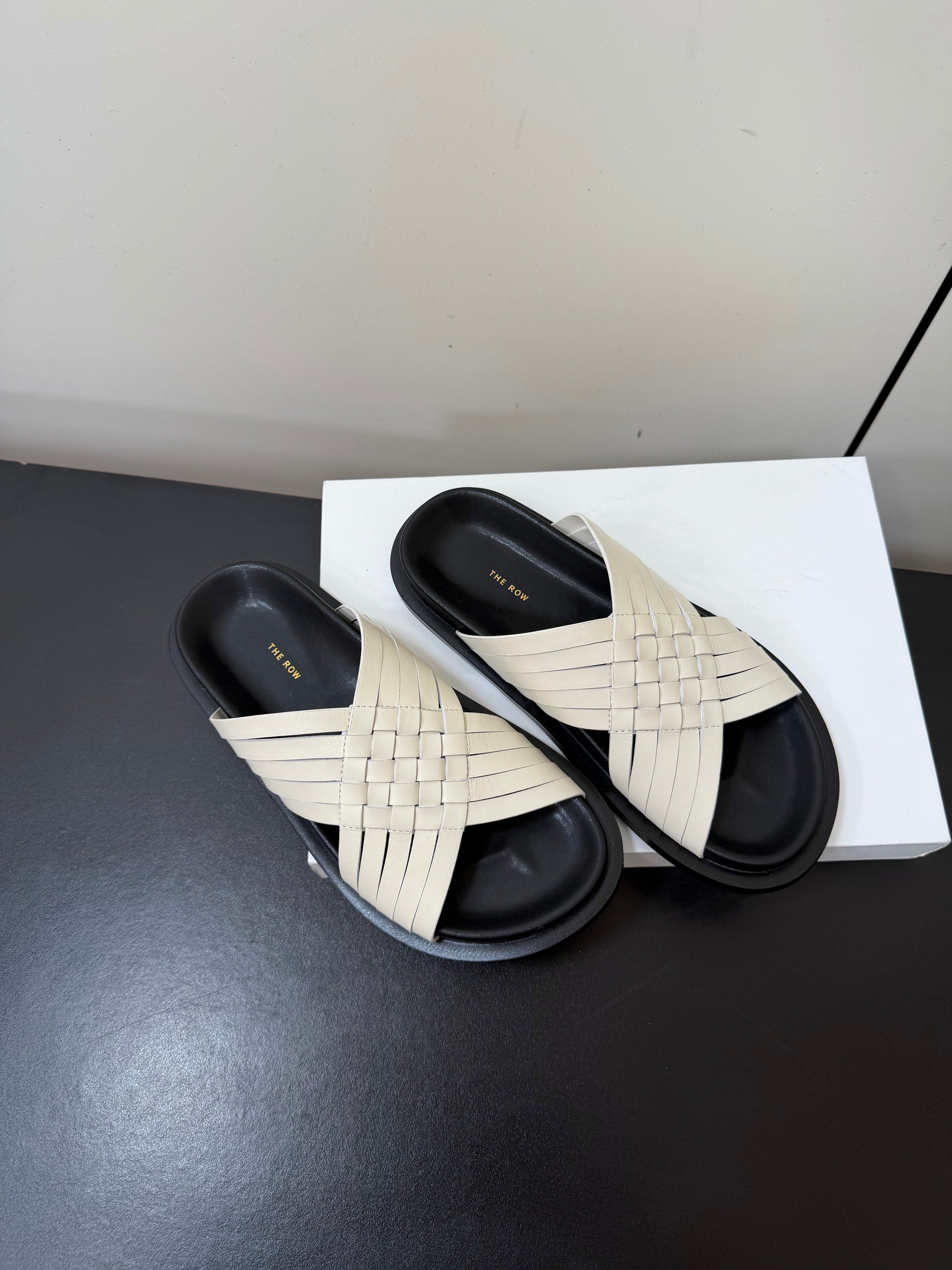 THE ROW 26S CROSS STRAP SANDALS IN IVORY WHITE CALFSKIN
