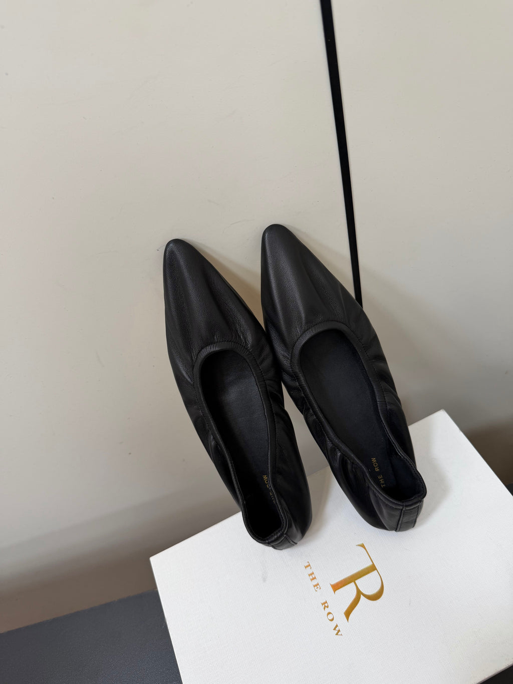 THE ROW 26S POINTED TOE BALLET FLATS IN BLACK LAMBSKIN