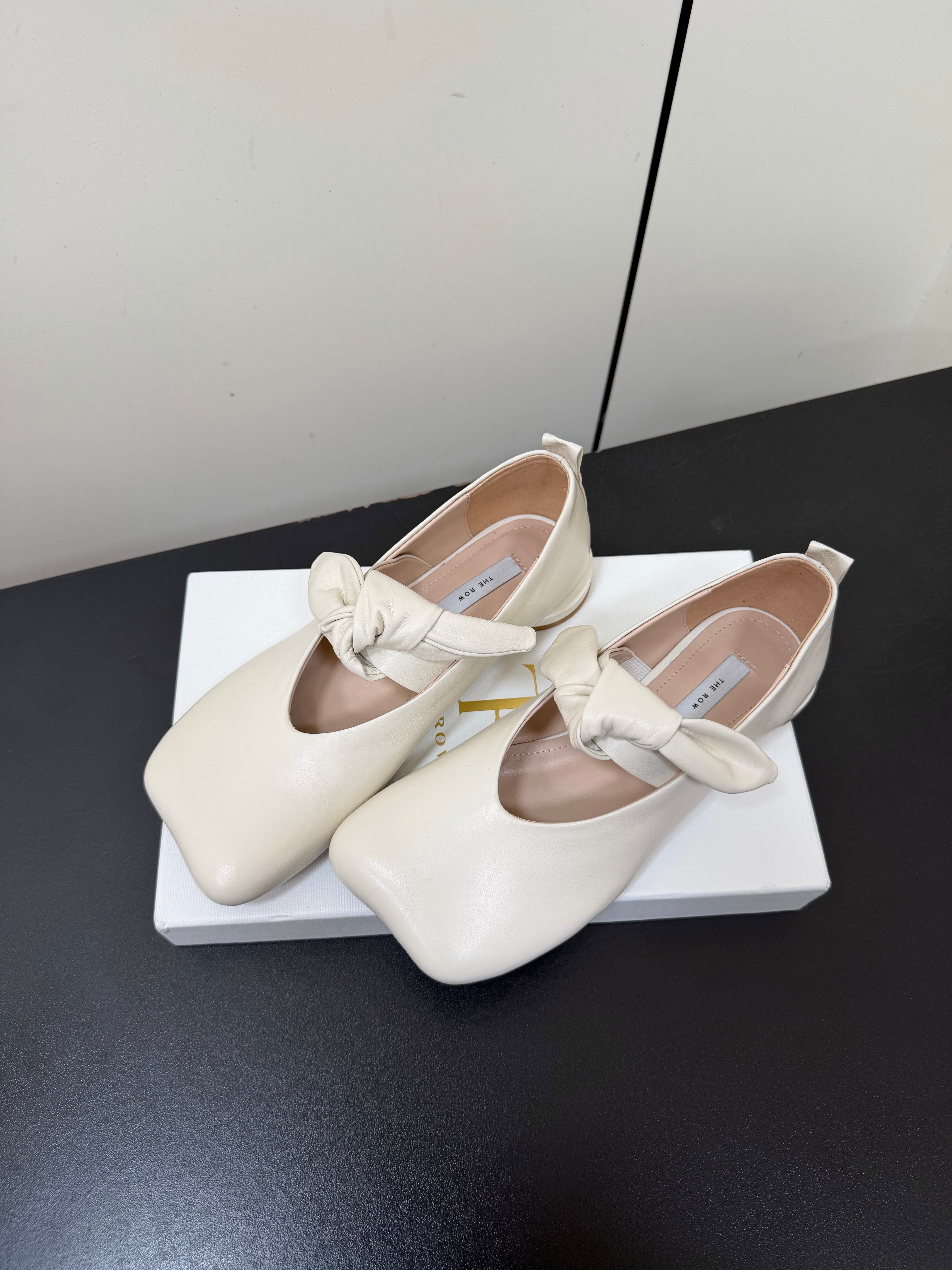 THE ROW 26S BALLET FLATS IN IVORY WHITE KNOT DETAIL CALFSKIN WITH SQUARE TOE
