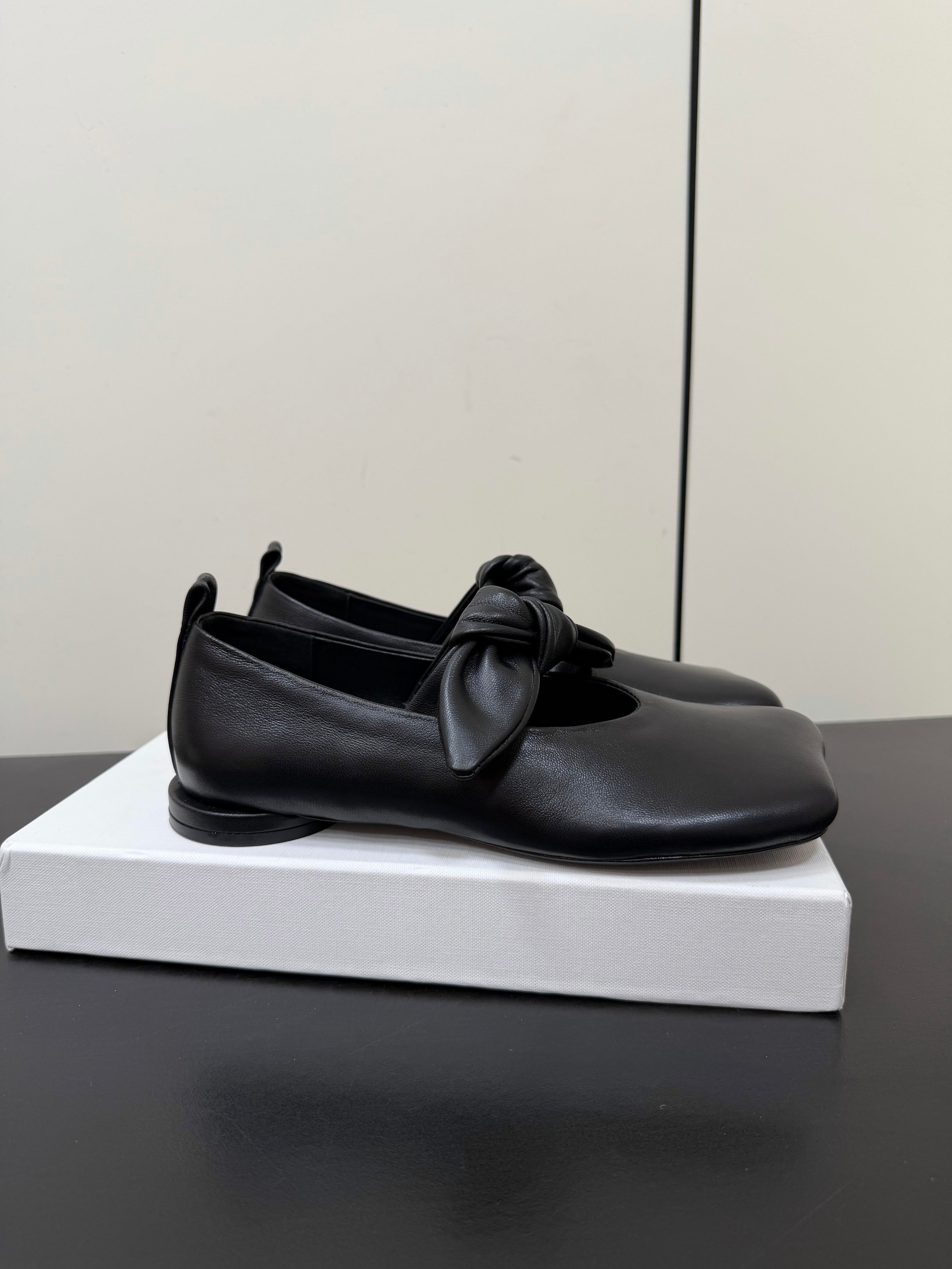 THE ROW 26S BALLET FLATS IN BLACK KNOT DETAIL CALFSKIN WITH SQUARE TOE