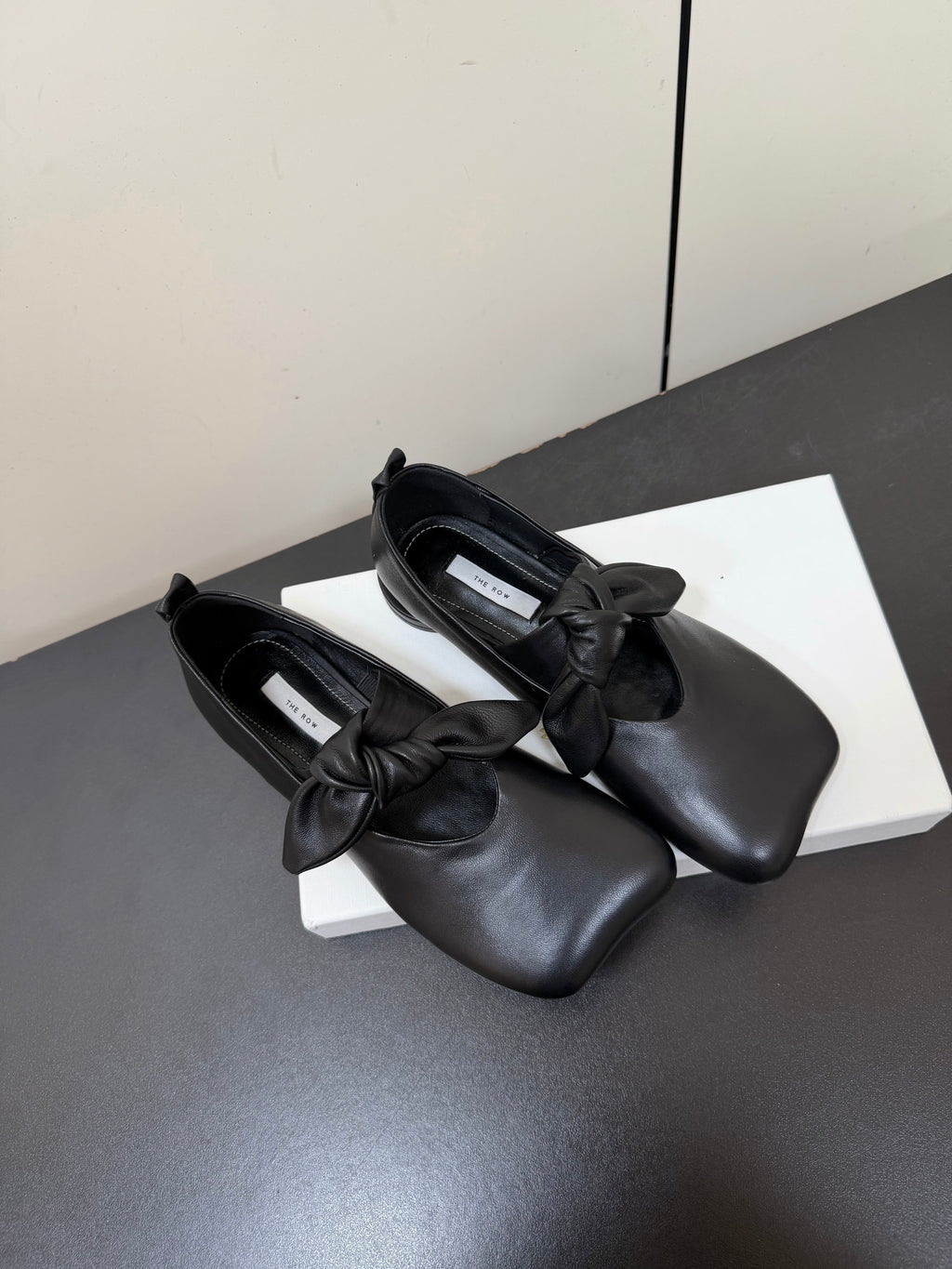 THE ROW 26S BALLET FLATS IN BLACK KNOT DETAIL CALFSKIN WITH SQUARE TOE