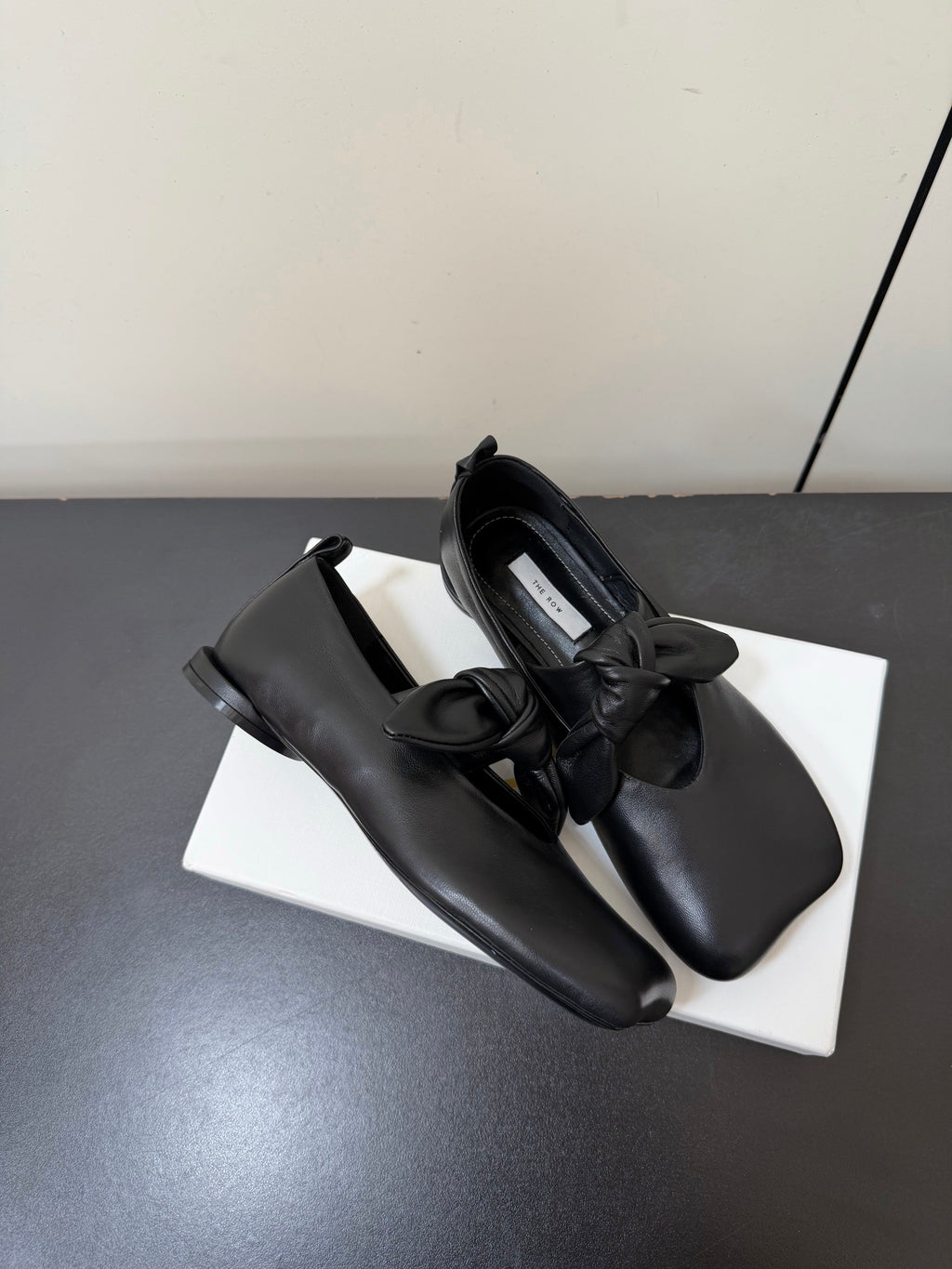 THE ROW 26S BALLET FLATS IN BLACK KNOT DETAIL CALFSKIN WITH SQUARE TOE