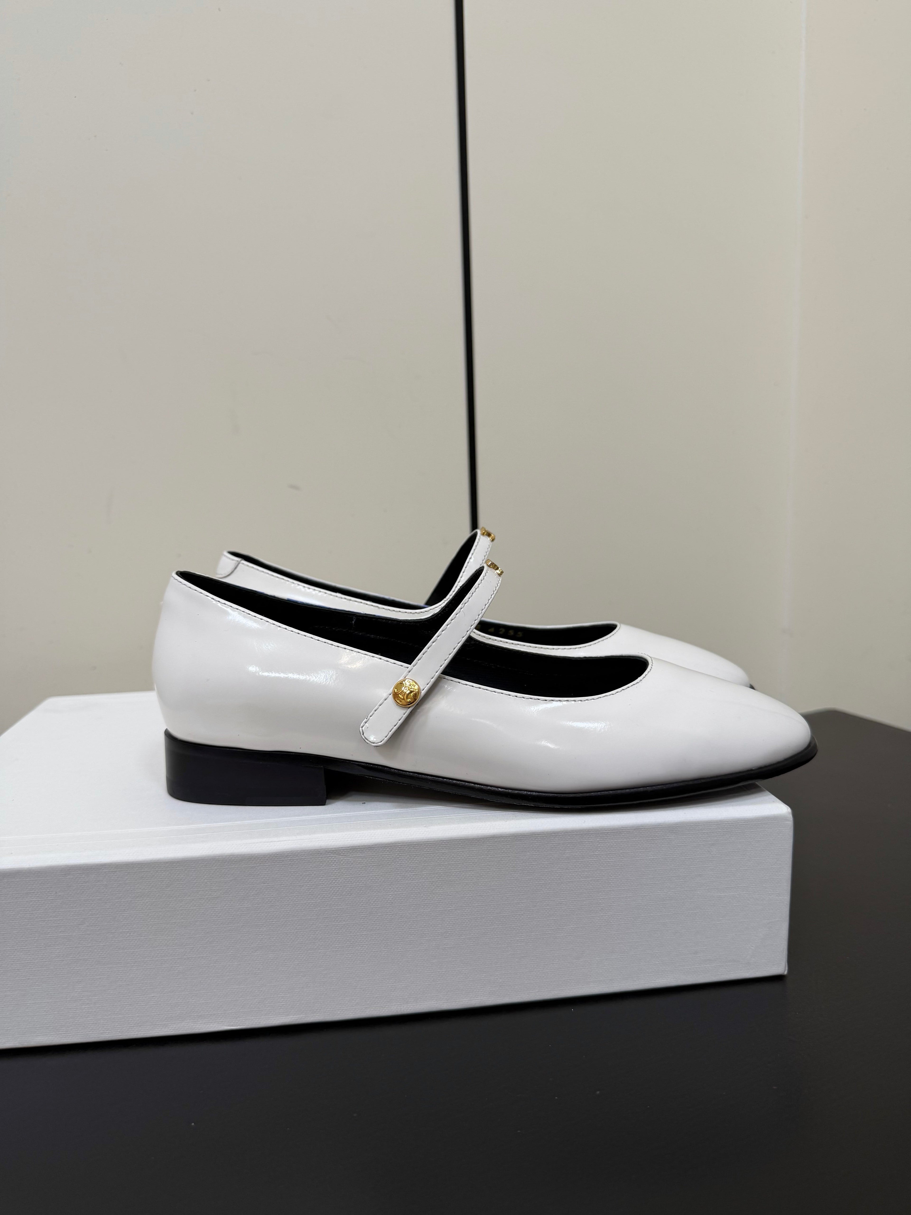 CELINE 26S MARY JANE FLATS IN WHITE GLOSSY CALFSKIN GOLD HARDWARE