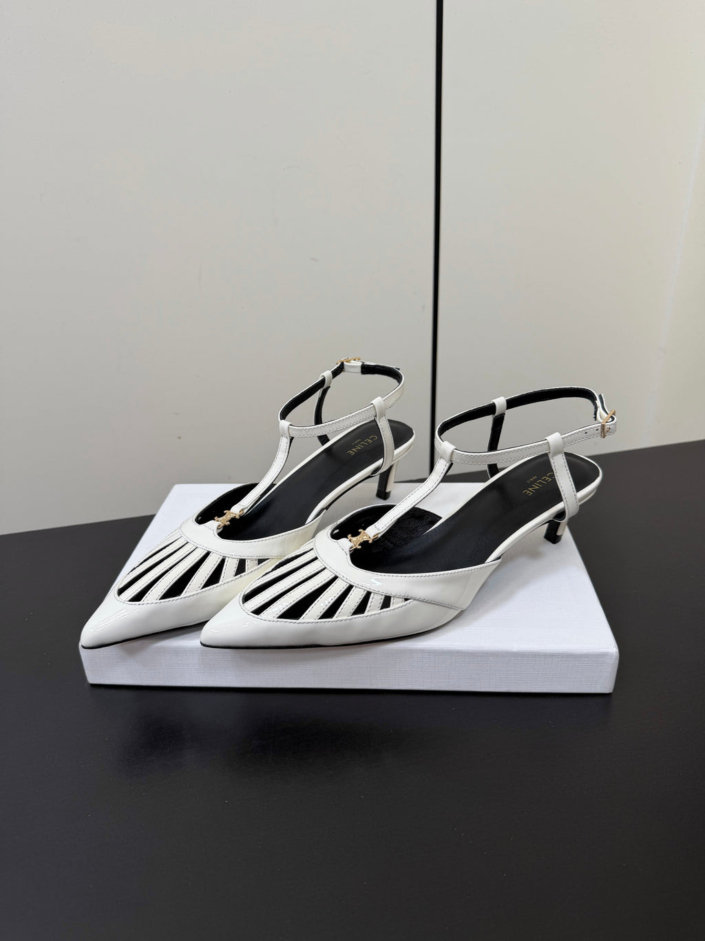 CELINE 26S TRIOMPHE T-STRAP SLINGBACK PUMPS IN WHITE PATENT CALFSKIN