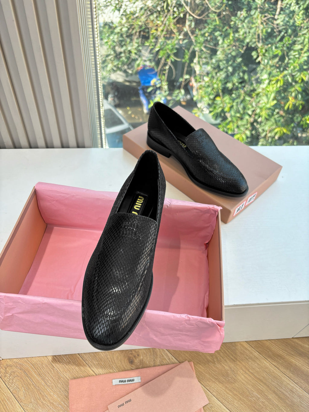 MIUMIU 26S LOAFERS IN BLACK SNAKE EMBOSSED CALFSKIN