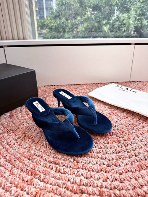 ALAIA 26S HEELED THONG SANDALS IN DARK BLUE VELVET