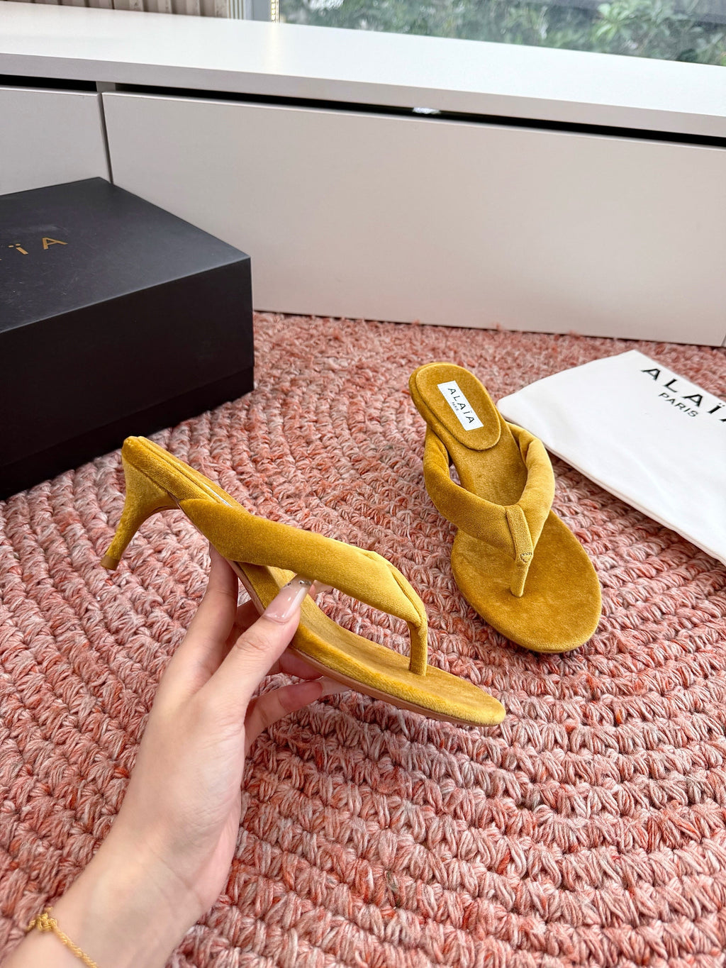 ALAIA 26S HEELED THONG SANDALS IN MUSTARD YELLOW VELVET