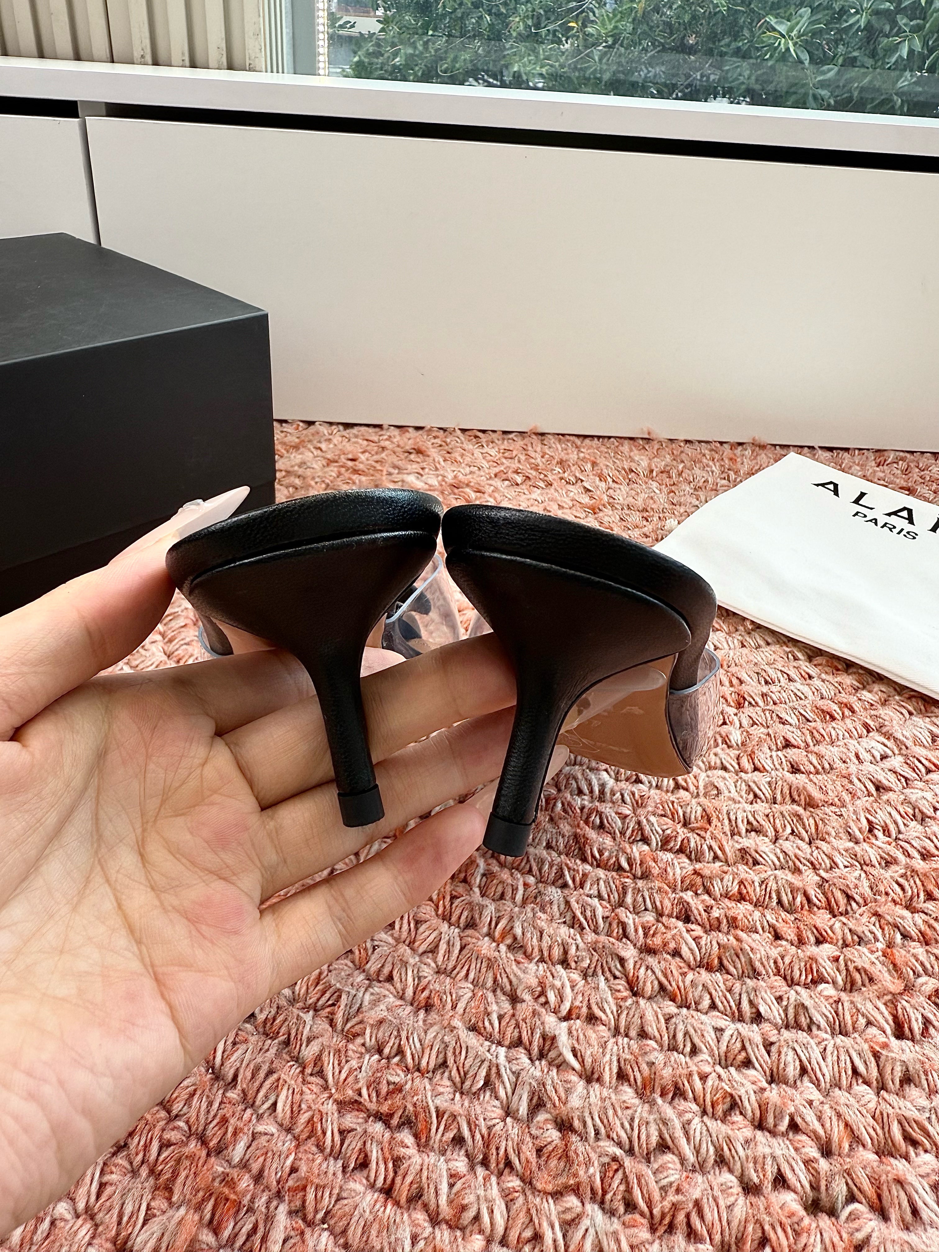 ALAIA 26S MULE HEELS IN BLACK LAMBSKIN AND TRANSPARENT PVC