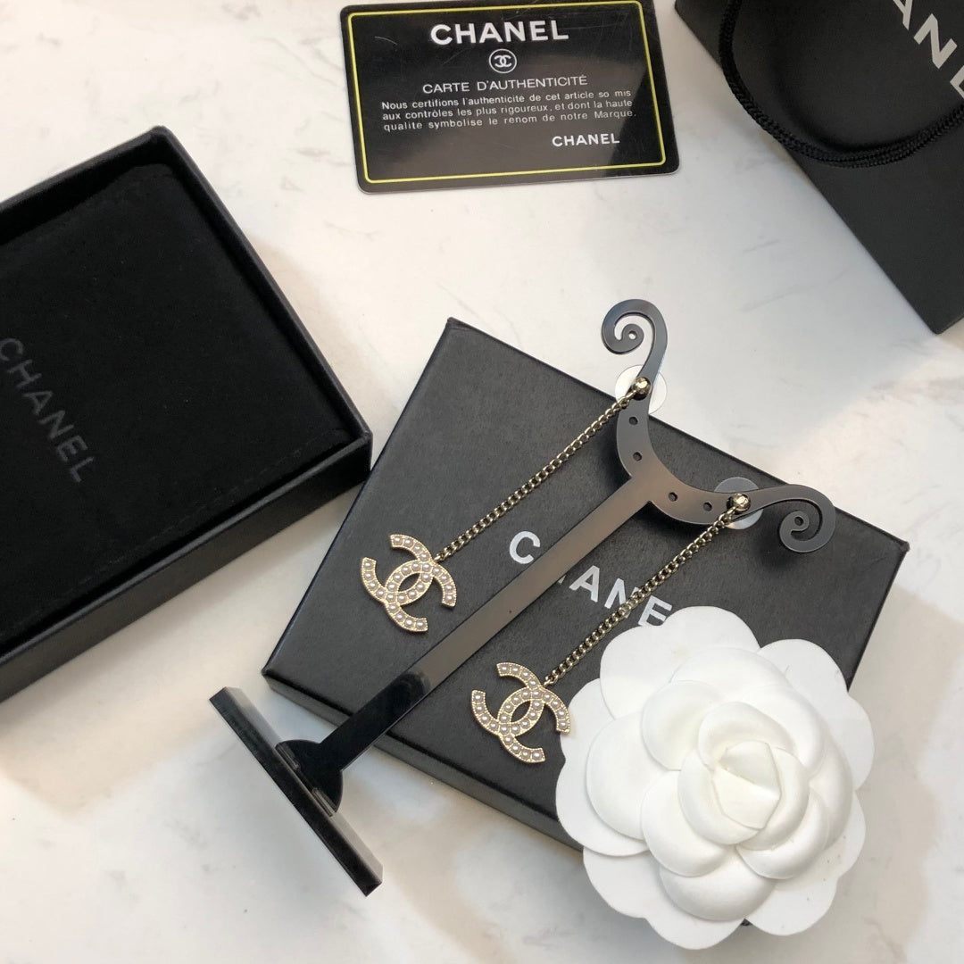 CHANEL 26S DOUBLE C LOGO PEARL PAVE DROP CHAIN EARRINGS IN GOLD METAL 631010