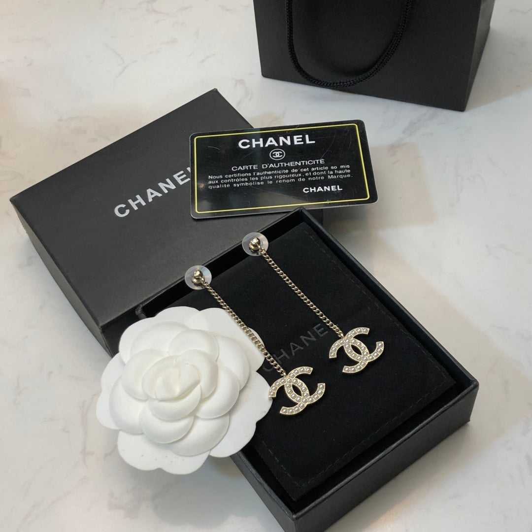 CHANEL 26S DOUBLE C LOGO PEARL PAVE DROP CHAIN EARRINGS IN GOLD METAL 631010