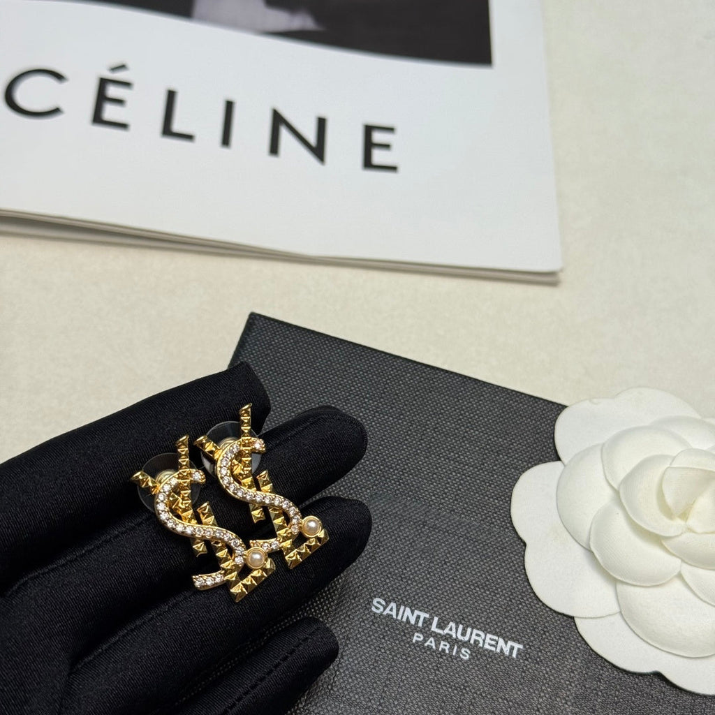 YSL 26S STUDDED CRYSTAL PEARL LOGO EARRINGS IN GOLD TONE METAL 629138