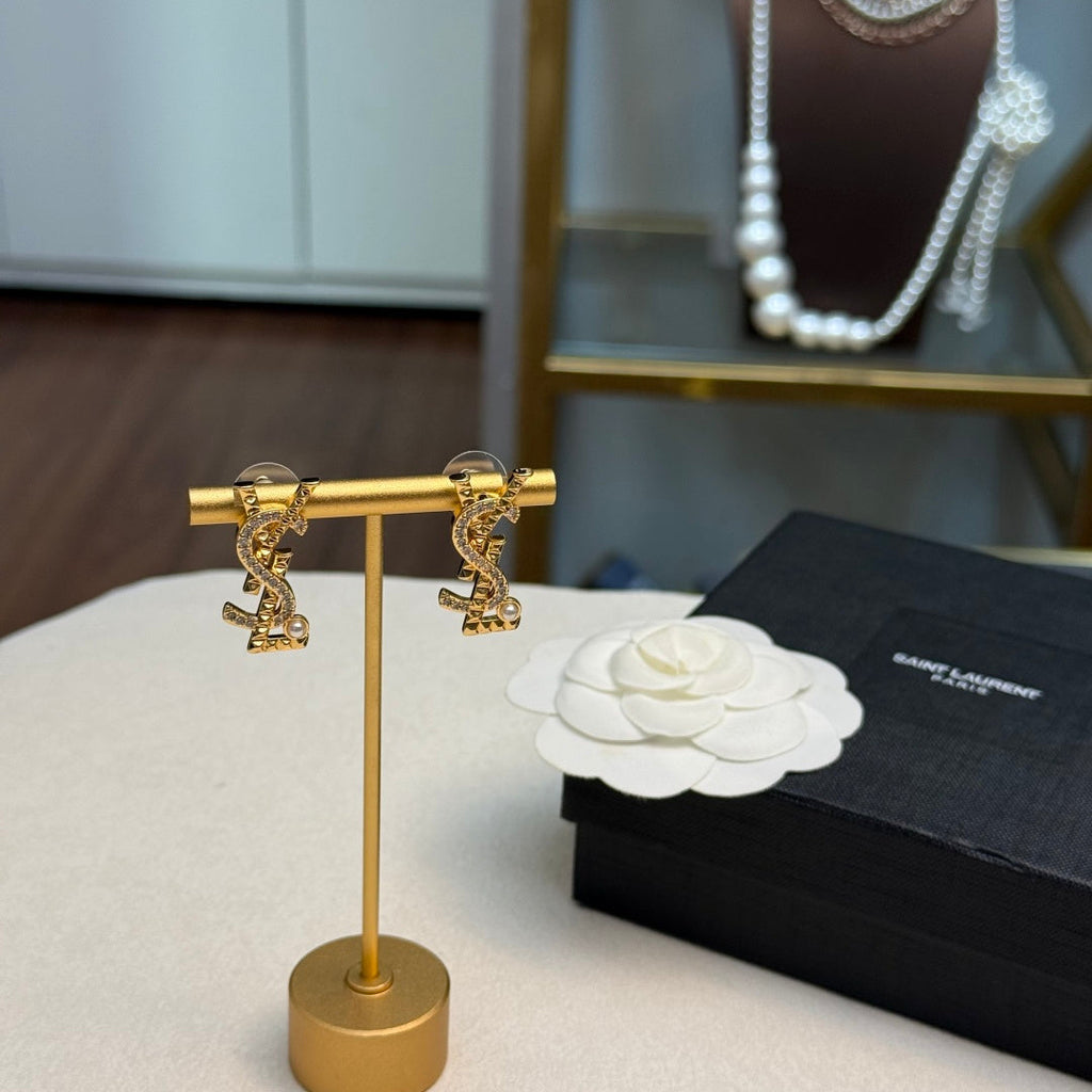 YSL 26S STUDDED CRYSTAL PEARL LOGO EARRINGS IN GOLD TONE METAL 629138