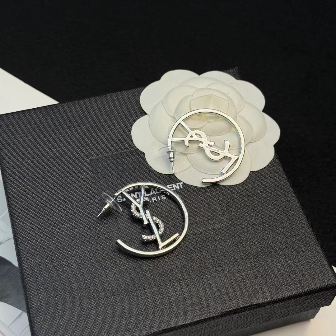 YSL 26S CRYSTAL LOGO HOOP EARRINGS IN SILVER TONE METAL 629137