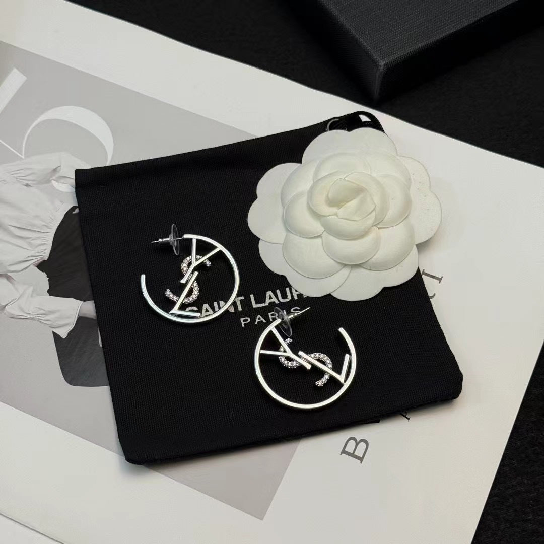 YSL 26S CRYSTAL LOGO HOOP EARRINGS IN SILVER TONE METAL 629137