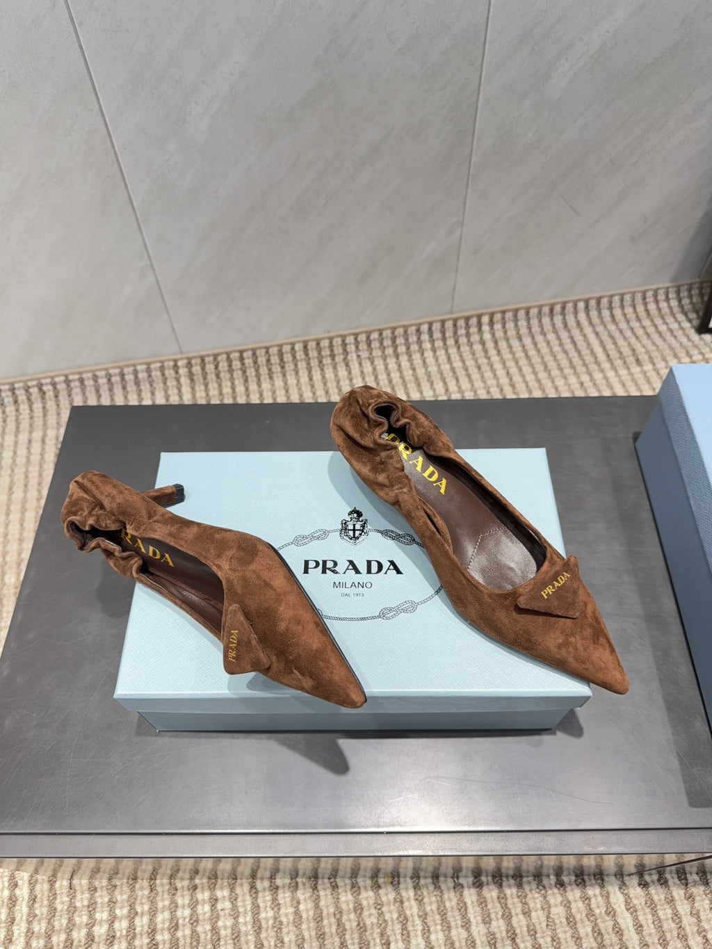 PRADA 26S PUMPS 55MM IN BROWN SUEDE WITH LOGO
