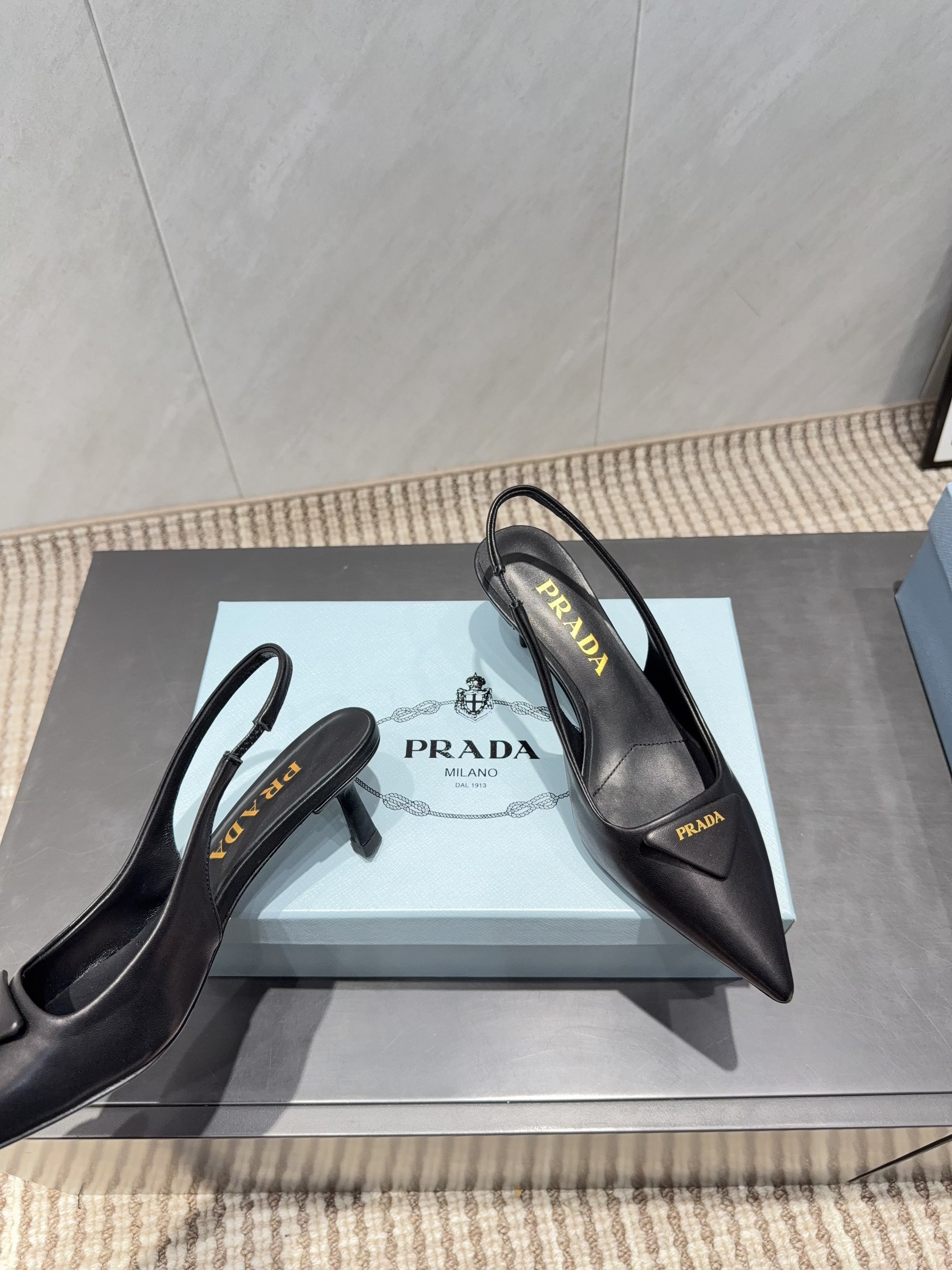 PRADA 26S POINTED TOE SLINGBACK HIGH HEELS 55MM IN BLACK SHEEPSKIN WITH LOGO