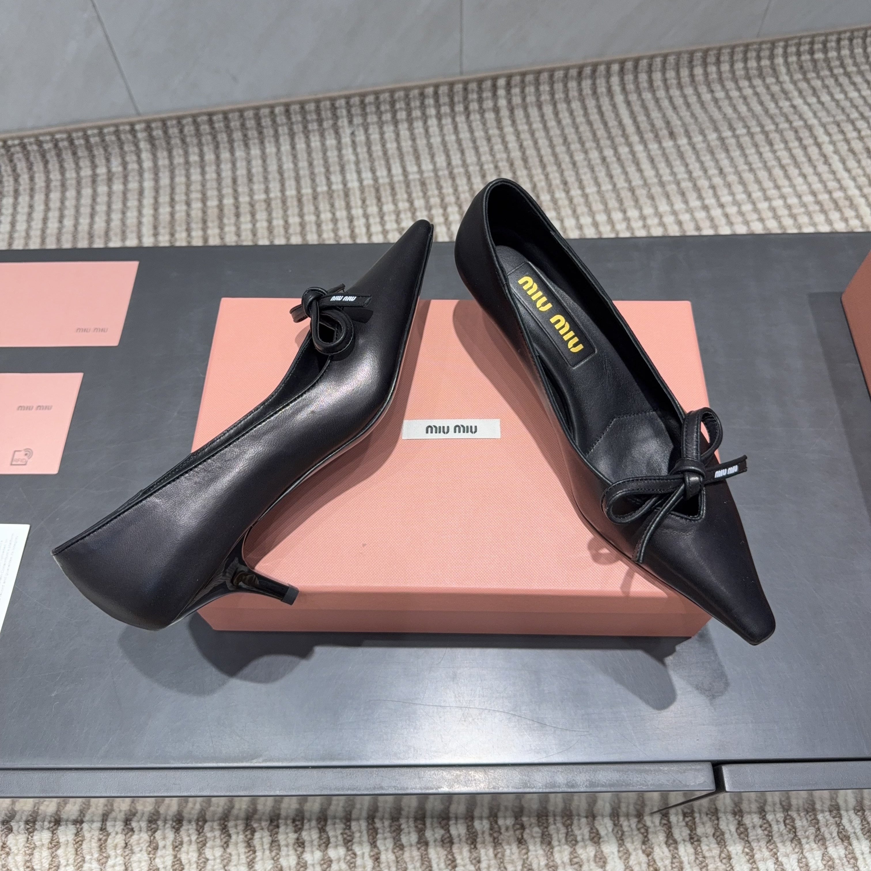MIUMIU 26S POINTED TOE PUMPS 55MM IN BLACK CALFSKIN WITH BOW