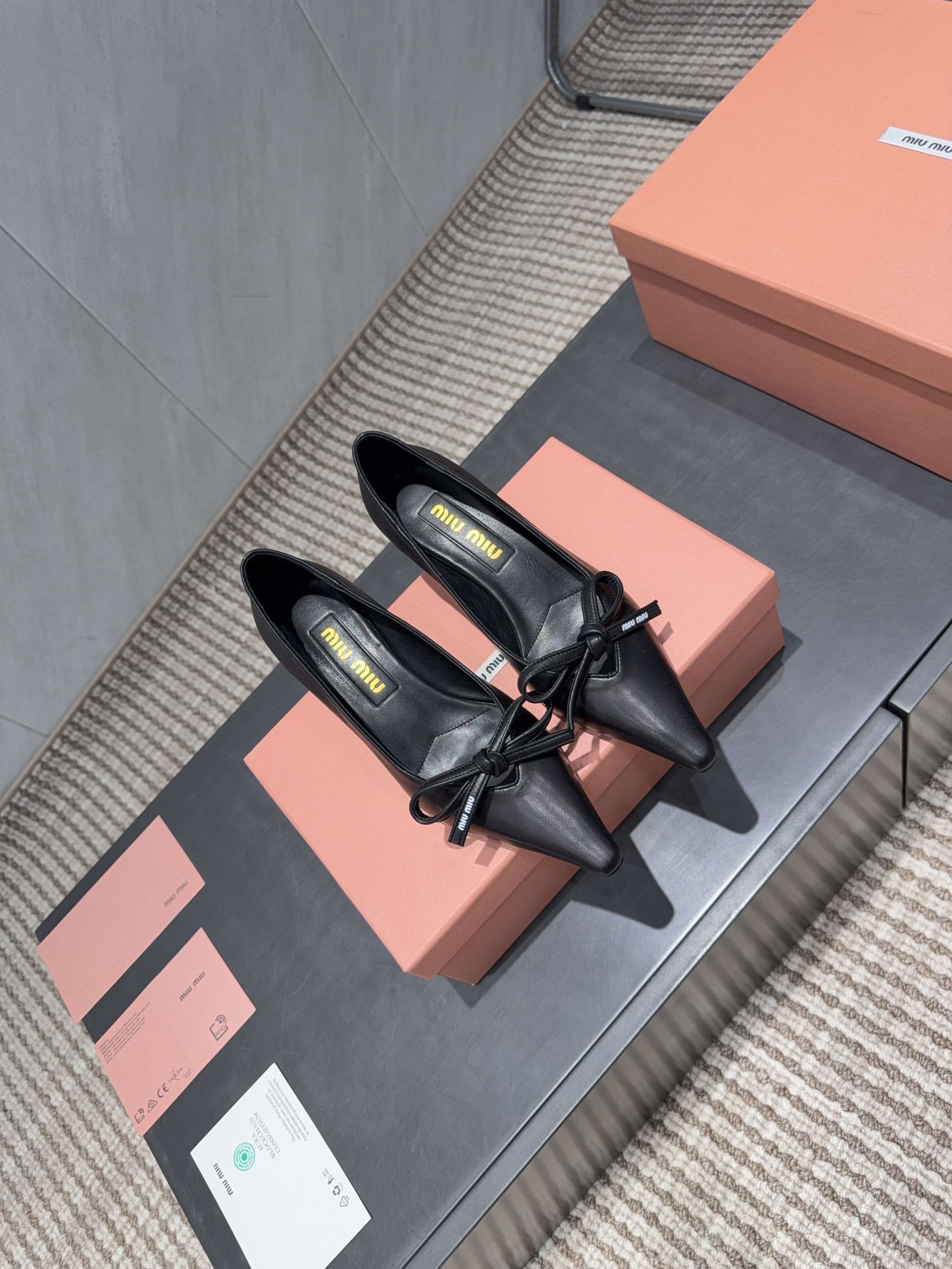 MIUMIU 26S POINTED TOE PUMPS 55MM IN BLACK CALFSKIN WITH BOW