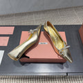 MIUMIU 26S POINTED TOE PUMPS 55MM IN GOLD CALFSKIN WITH BOW