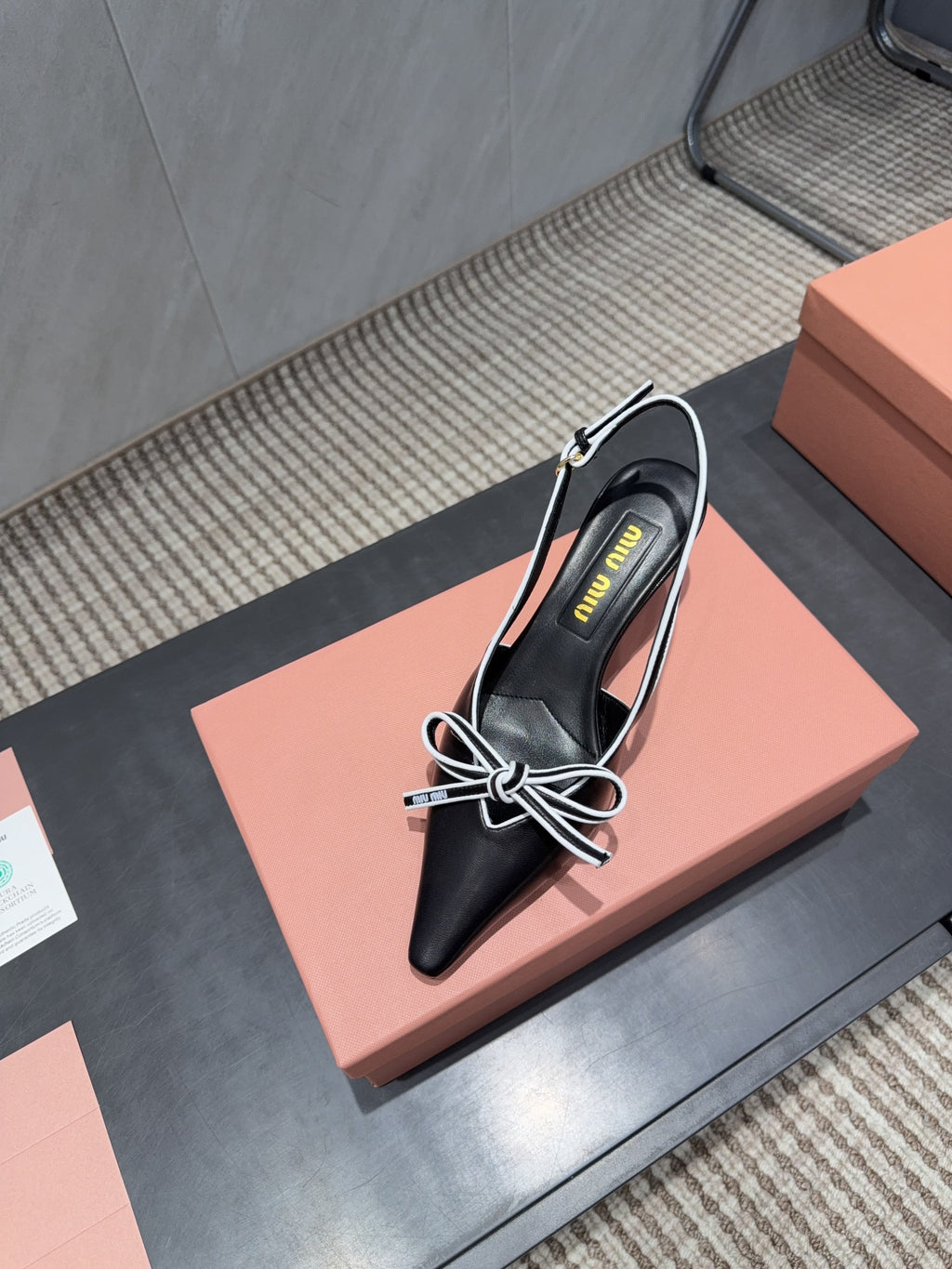 MIUMIU 26S SLINGBACK 55MM IN BLACK AND WHITE CALFSKIN WITH BOW