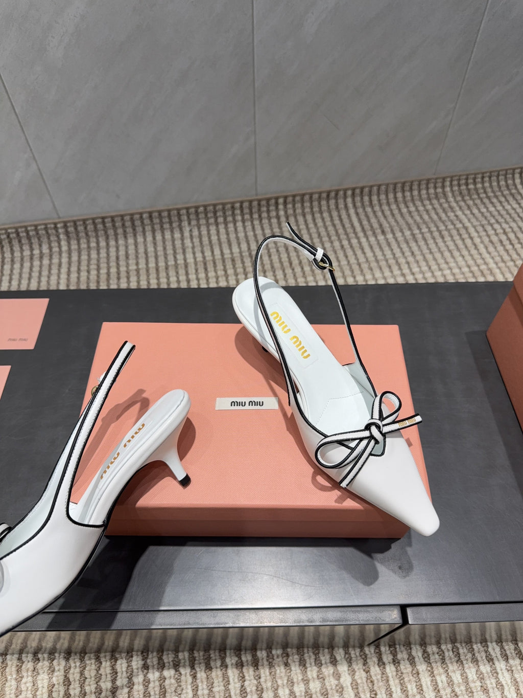 MIUMIU 26S SLINGBACK 55MM IN WHITE AND BLACK CALFSKIN WITH BOW
