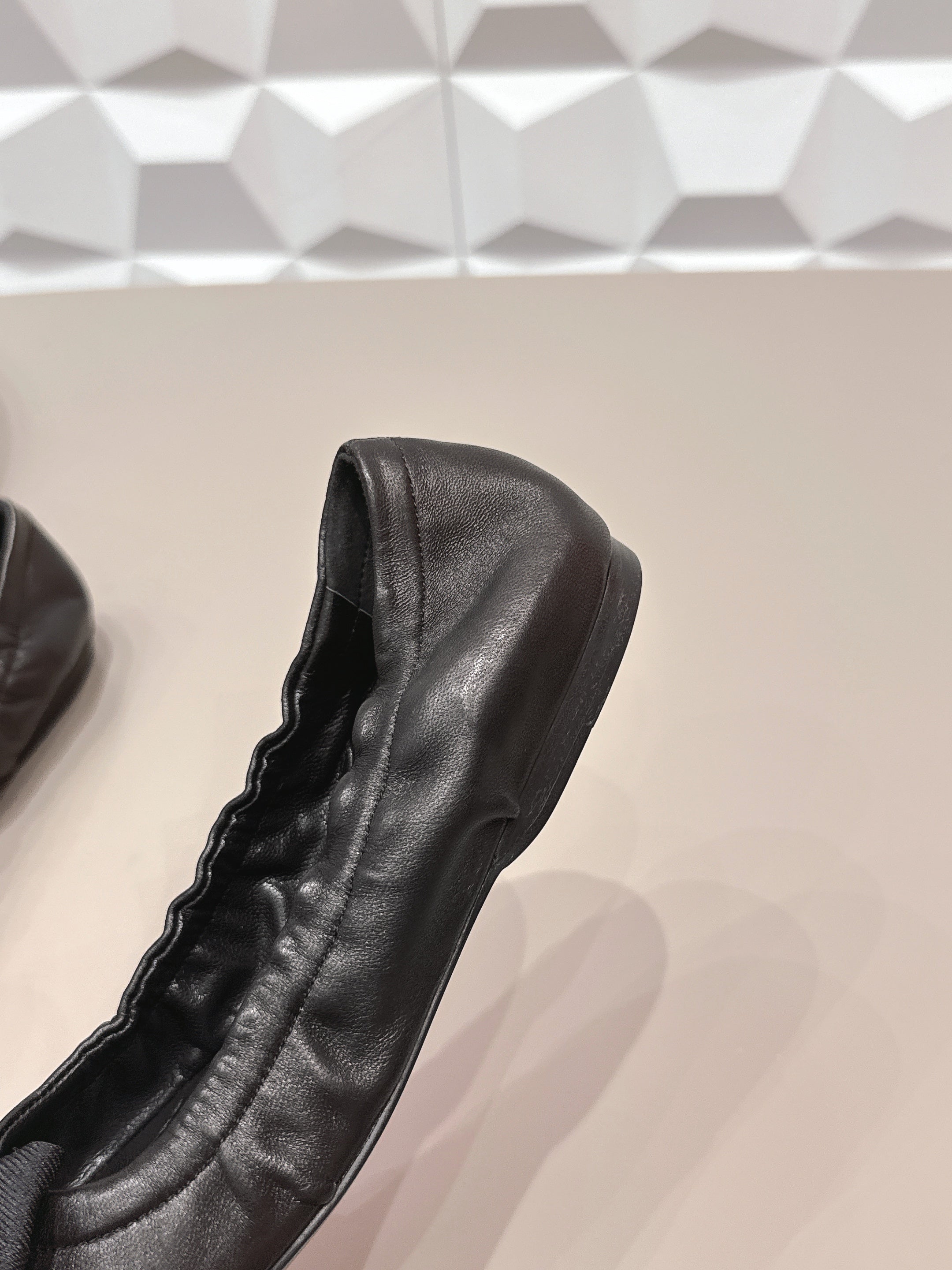 PRADA 26S ROUND TOE FLATS WITH BOW IN BLACK CALFSKIN
